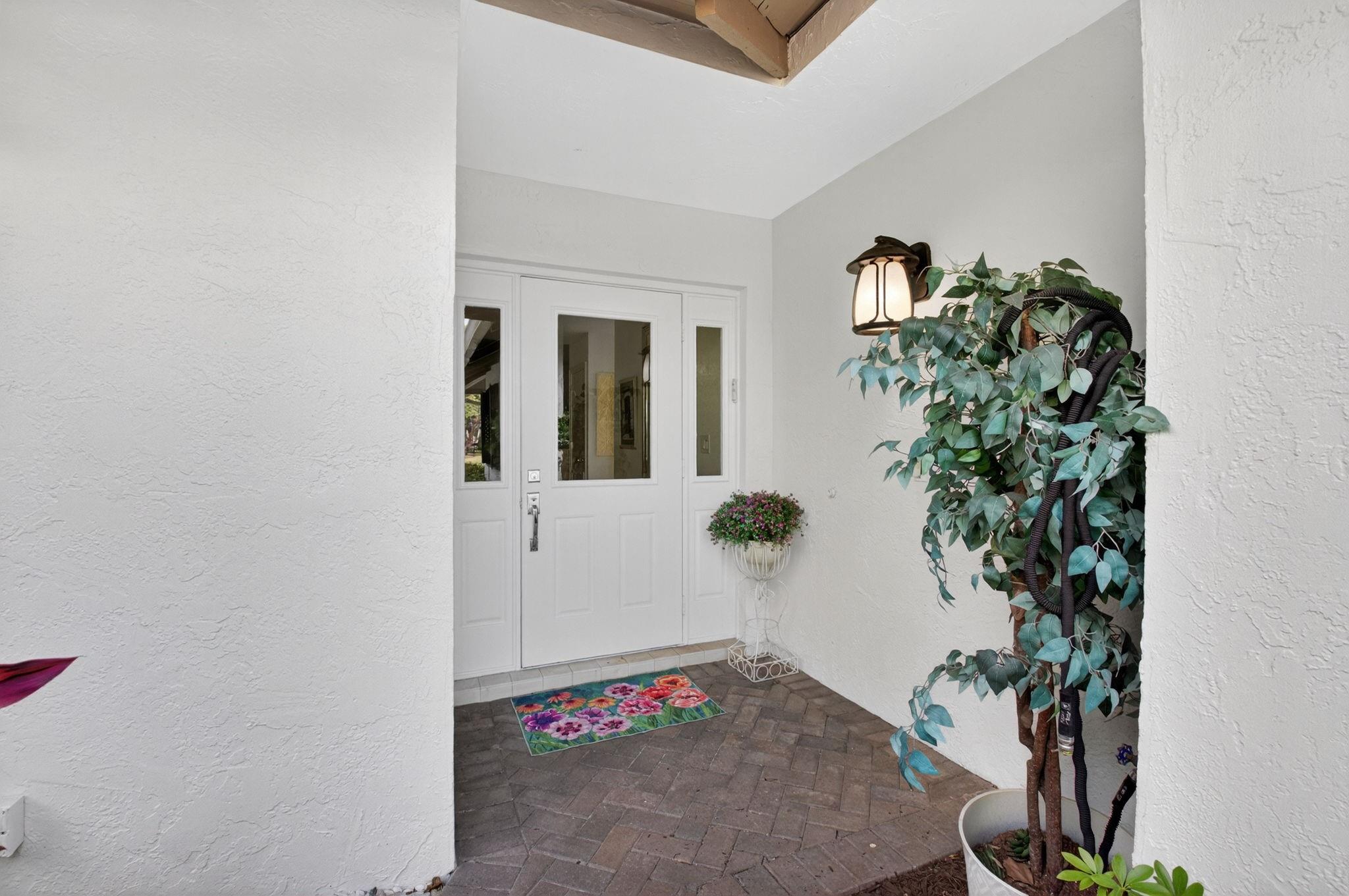 Welcome to this beautifully maintained and thoughtfully renovated villa in the highly desirable Waters Reach section of Boca West Country Club. This stunning 2 bedroom 2 bath home is the epitome of style, comfort and smart design.
The spacious modern eat in kitchen boasts sleek, contemporary finishes  and offers an inviting space for both everyday living and entertaining. Every detail in the home has been carefully considered. The master bedroom and bathroom reflect a blend of luxury and functionality. Enjoy lush serene garden views from the patio with the golf course just beyond. Perfect for relaxation! This is more than just a home, its a lifestyle. A must see villa in one of Boca Ratons most prestigious communities. MOTIVATED SELLER, bring all offers!!!