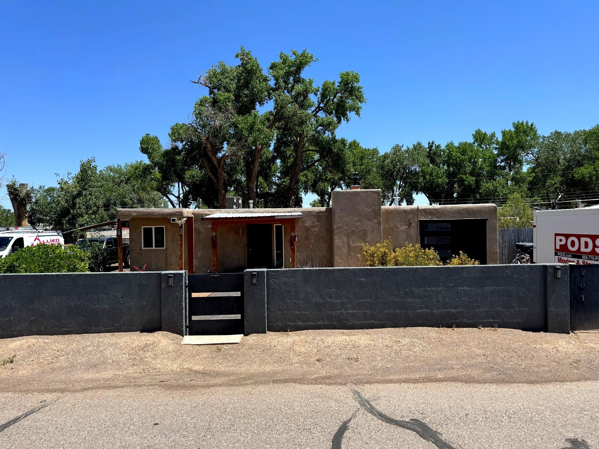 Peaceful, Private & Stunning Views, Step into serenity with this beautifully remodeled 2-bedroom, 2-bathroom home nestled along the lush Rio Grande Bosque. Surrounded by mature cottonwood trees, this private oasis offers both modern upgrades and the timeless charm of New Mexico's natural landscape. Every detail of this home has been thoughtfully updated--from the new TPO roof, energy-efficient windows, and brand-new AC unit, to the polished concrete floors that lend a sleek, contemporary touch throughout. The kitchen and bathrooms have been fully upgraded, featuring stylish finishes and modern fixtures that elevate both comfort and convenience. Enjoy peace of mind with all-new well equipment and a new septic system, ensuring efficient
