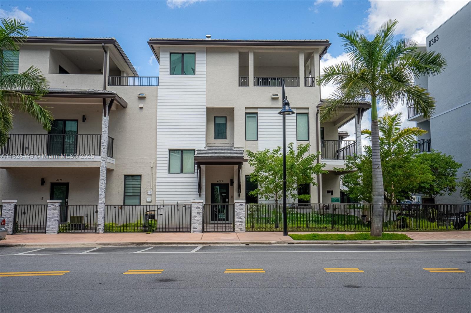 RARE OPPORTUNITY!! EXCLUSIVE 3 STORY "CG SKYVIEW MODEL" TOWNHOUSE URBANA AT DORAL TOWN SOUTH PHASE II. DISCOVER A ONE OF A KIND THREE LEVEL TOWNHOUSE - THE ONLY 3 STORY CG SKYVIEW FLOOR PLAN CURRENTLY AVAILABLE IN THE SOUTH PHASE II. THIS EXCLUSIVE MODEL BOAST AN IMPRESSIVE 2,336 SQ FT OF THROUGH FULLY DESIGNED LIVING SPACE WITH ROOFTOP TERRACES OFFERING ENTERTAINING SPACE AND AN BREATHTAKING BBQ TERRACE THAT DEFINES OUTDOOR LUXURY. THIS TOWNHOUSE FEATURES 3 BEDS/ 3 FULL BATHS /1 HALF BATH. OPEN CONCEPT KITCHEN WITH STAINLESS STEEL APPLIANCES, QUARTZ COUNTERTOPS, CERAMIC FLOOR THROUGH OUT, MODERN BATHROOMS DESIGN, IMPACT WINDOWS, SMART LIGHTING, VIDEO DOORBELL URBANA RESORT STYLE COMMUNITY OFFERS A CLUB HOUSE, FITNESS CENTER, SWIMMING POOL WITH CABANAS, BUSINESS CENTER AND MORE!!