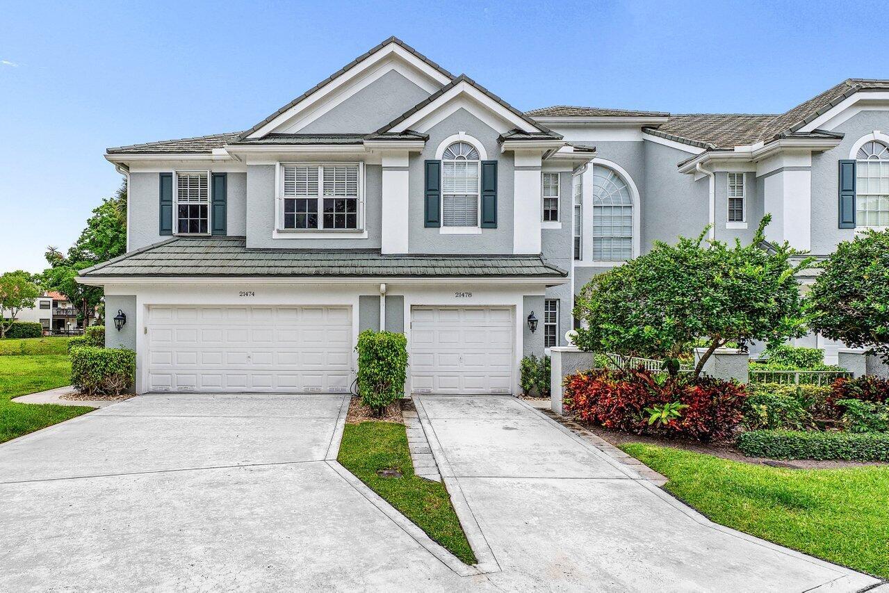 One of the Best Locations within the Community, Stylishly Updated 3 bedroom Corner Townhome w/ Southern Exposure, located just minutes from Town Center Mall, Dining, and Walking Distance to the Boca Raton Swim and Racquet Community Center. Features a Spacious 2-Car Garage with EV Charger, a Renovated Kitchen w/ Quartz Countertops, Engineered Wood Flooring throughout. The Primary Bedroom offers Vaulted Ceilings, and the Spa Inspired Bath includes a Double Vanity with Soaking Tub. Renovated Guest Bath & Powder Room, Enjoy the Covered Screened Patio with No Rear Neighbors Desirable Southern Exposure, Perfect for Entertaining. Situated in a Quiet, Gated Community and Zoned for Top-Rated Boca Raton Schools. This Townhouse Offers the Ideal blend of Style, Function, and Unbeatable Location