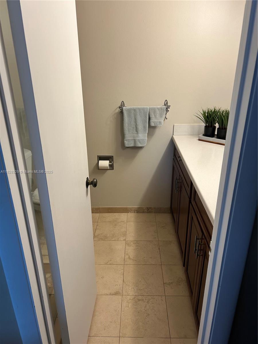 Modern kitchen with designer features at 3100 49th St - Condo in Fort Lauderdale