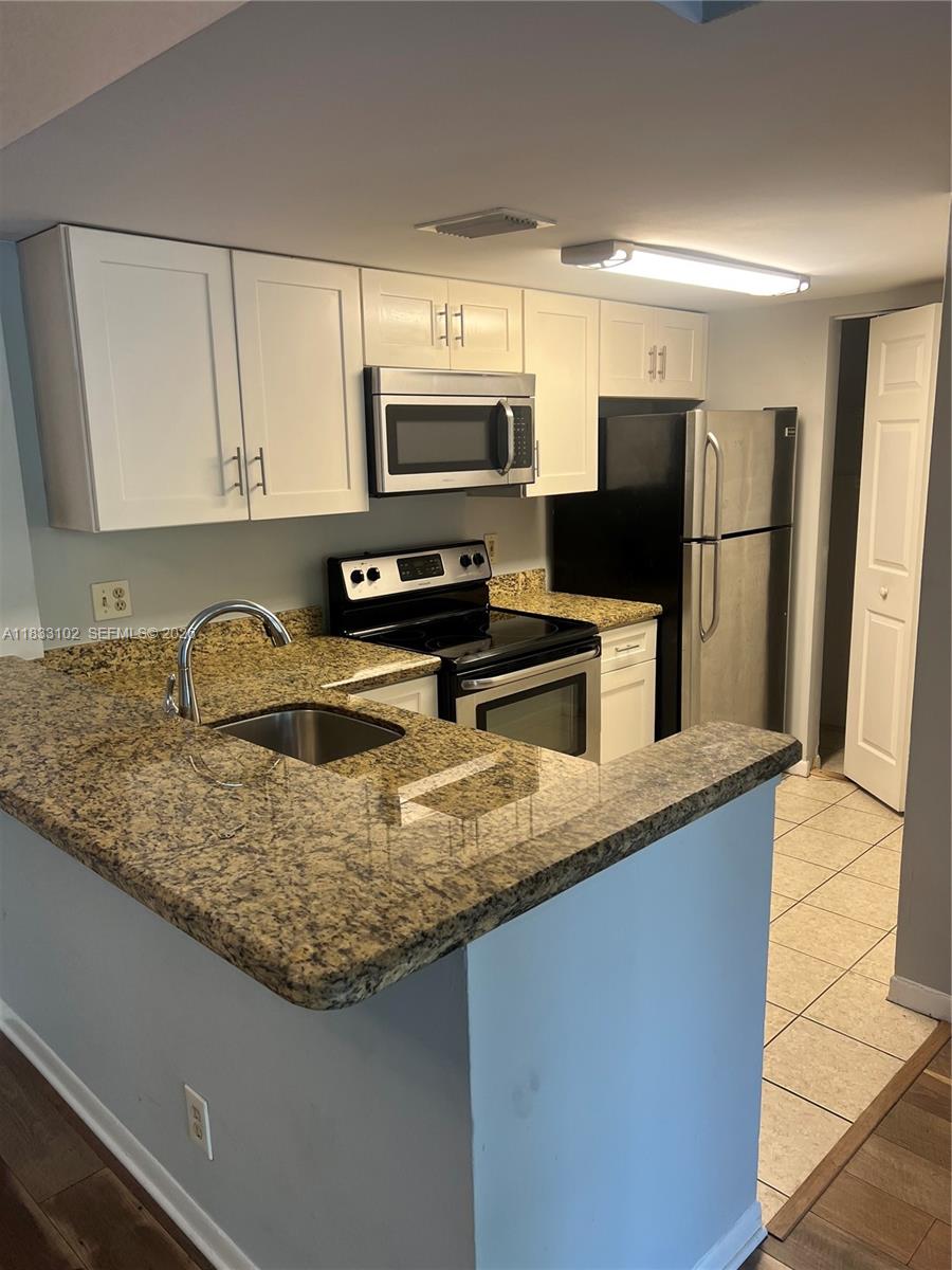 Lakes Of Jacaranda Condo