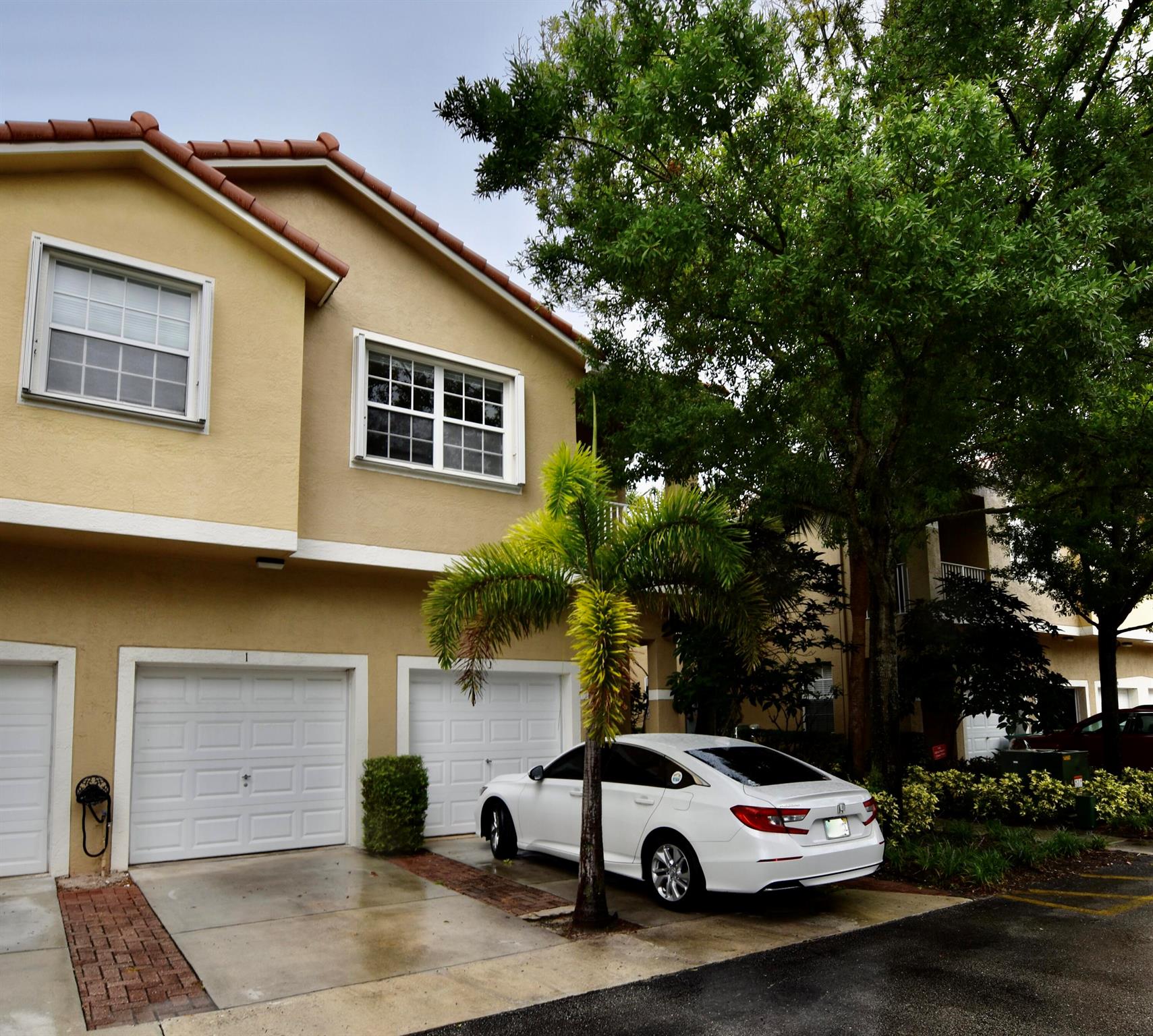 Open Floor Plan Condo:2 Bedroom, 2 Bath, 1 Car Garage, 1035 s.f., 2nd Floor Condo in Quiet Tequesta, Florida.   Includes primary bedroom with en-suite bathroom and large walk-in closet. Laundry closet with washer (1 year old)/dryer.  Kitchen has 1 year old refrigerator and new dishwasher.  Accordion Hurricane shutters.  1 year old water heater. Roof replaced 2023.  End unit is in back of the community.  Community Pool and playground.  Well run homeowners' association with reserves.  Close to beaches, dining, Publix, Starbucks, pharmacy.  A rated school. Minutes from beaches.