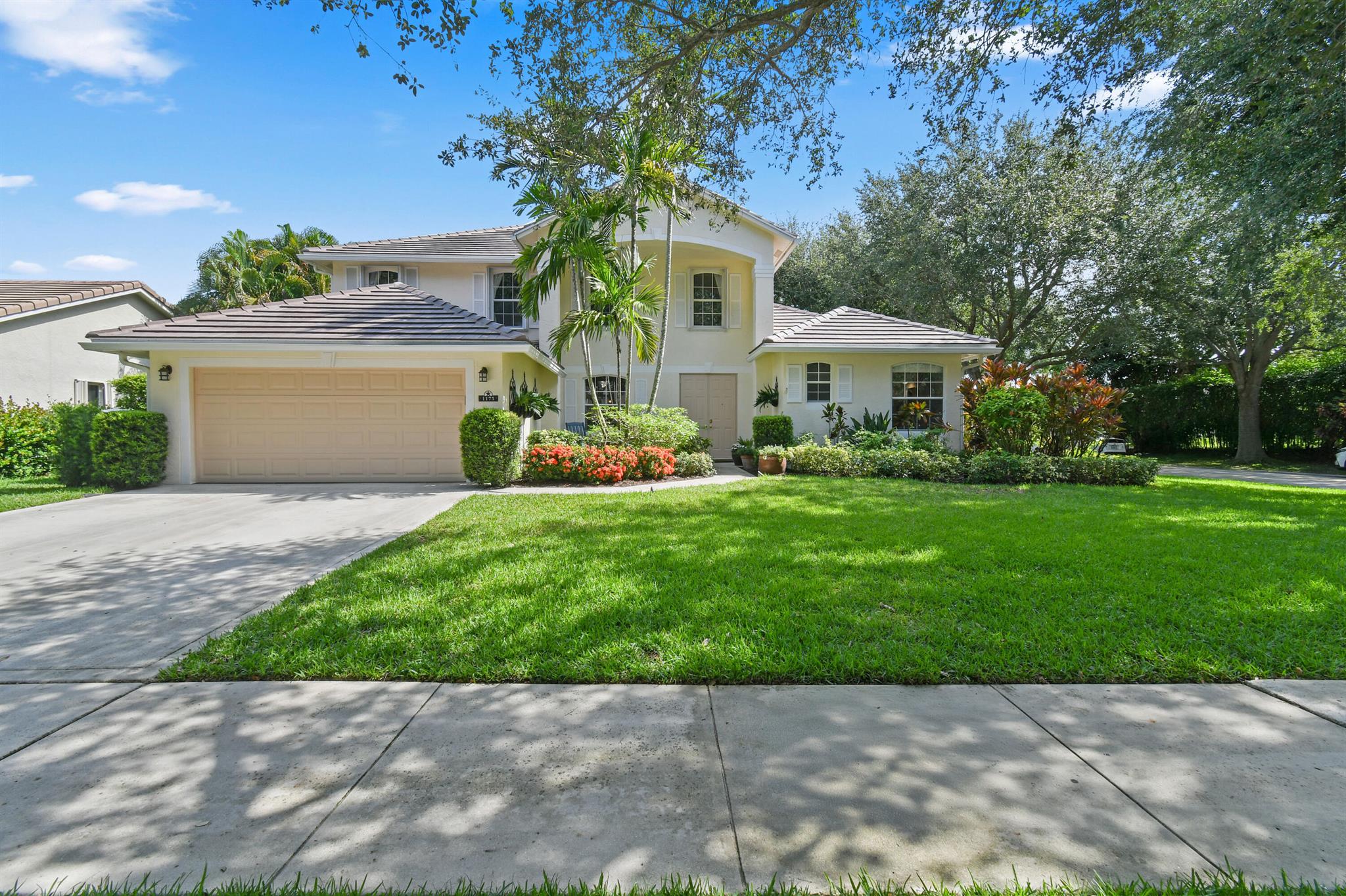 This is the home you have been waiting for within the sought after community of Egret Landing. You will have peace of mind with a NEW ROOF (JULY 2025) WITH WARRANTY TO THE NEW OWNER. This is a 5 bedroom, 3 and a half bathroom home with the Primary Suite downstairs. The primary bathroom has been renovated along with the two bathrooms upstairs. The kitchen has been tastefully updated with quartz countertops, custom pullouts, new lighting, and has stainless steel appliances. Egret landing has natural gas which is perfect for the Cafe series double oven with gas cooktop that you undoubtedly will enjoy cooking on. In Nov of 2022 the floors downstairs were replaced with a beautiful Italian Porcelain made by Marazzi Uniche. The floors upstairs are real hardwood. This home is perfect for entertaining your friends and family with an amazing flow from inside to your outside garden. As you step outside you will be in a newly installed screen enclosure (2023) that encompasses the newly installed outdoor kitchen (2023) which is fully functional with electric, gas, and has gorgeous quartz countertops. The patio is an ivory travertine. The large backyard is landscaped to create a private oasis that is large enough for a custom swimming pool and is completely fenced in. You will have peace of mind with a new AC unit 2024, full hurricane protection with accordian shutters upstairs, impact glass french doors leading to the back patio, full shutter coverage downstairs, and the NEW FLAT TILE ROOF. Home has been recently painted inside and out. Egret Landing HOA includes fiber optic high speed internet, expanded cable package, a community pool, clubhouse, tennis, pickle ball, gym, basketball courts, soccer field, playground, picnic area, and a boat/RV storage lot. Egret Landing is a family friendly community with several planned events and clubs including fall festival, movie nights on the lawn, food trucks, and a day of making snow just to name a few. You will be residing in the heart of Jupiter/Juno Beach with plenty of restaurants, golf, Gardens Mall, Palm Beach International Airport, and Marlins/Cardinals spring training.