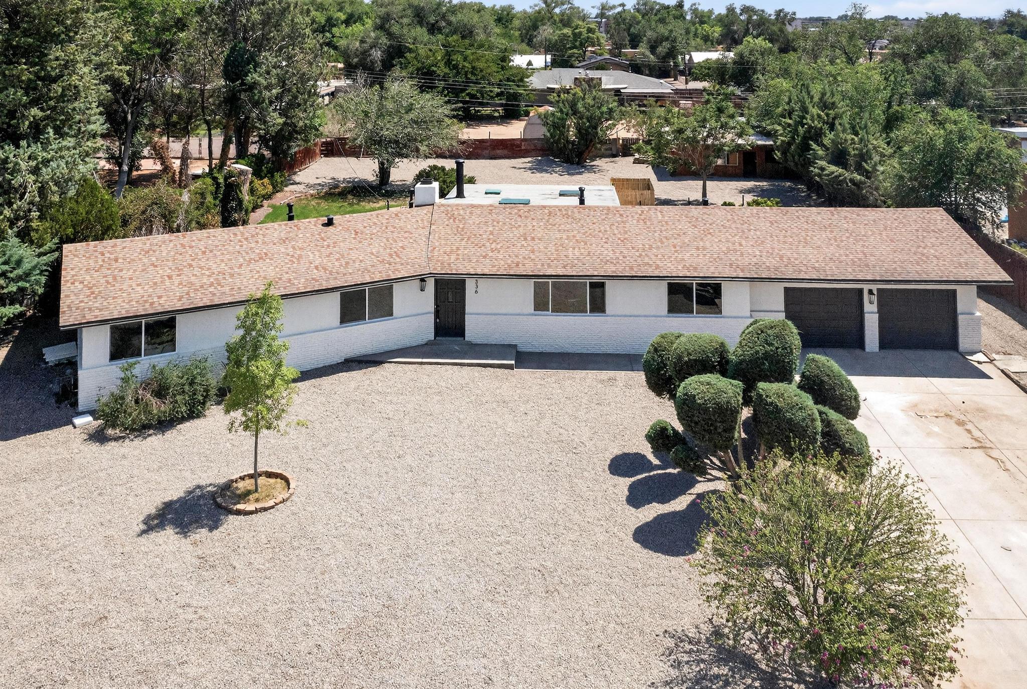 Homes for sale in Los Ranchos, NM | 336 Enchanted Valley Pl Nw, Los Ranchos, NM 87107 | MLS# 1087842