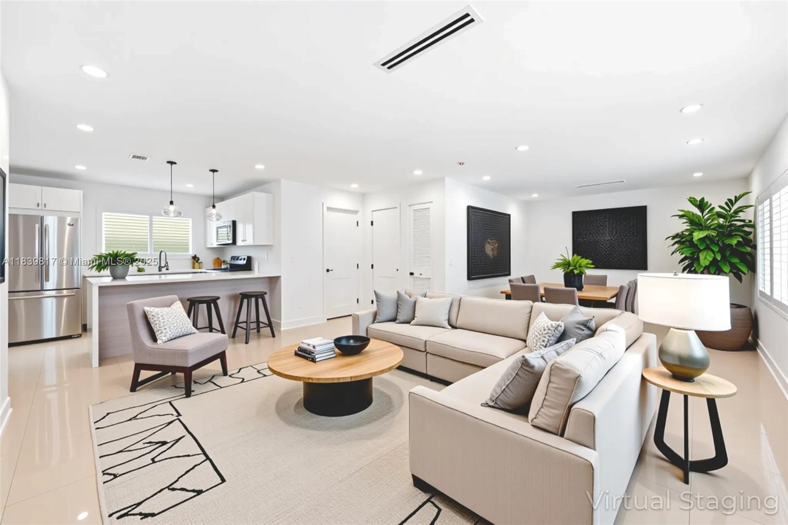 Beautifully renovated 2BR/2BA home in the heart of Coconut Grove, featuring a split floor plan, high-end finishes, top-of-the-line appliances, plantation shutters, and hurricane-impact windows. Originally a 3BR/2BA, the layout offers flexibility to convert back to a third bedroom or create a den/home office. Fully fenced, turfed yard with a charming front porch, ideal for entertaining. Located on a quiet, tree-lined street outside of a flood zone, just moments from the Marina, CocoWalk, and Grove dining and shopping. Zoned for top-rated schools including Coconut Grove Elementary.