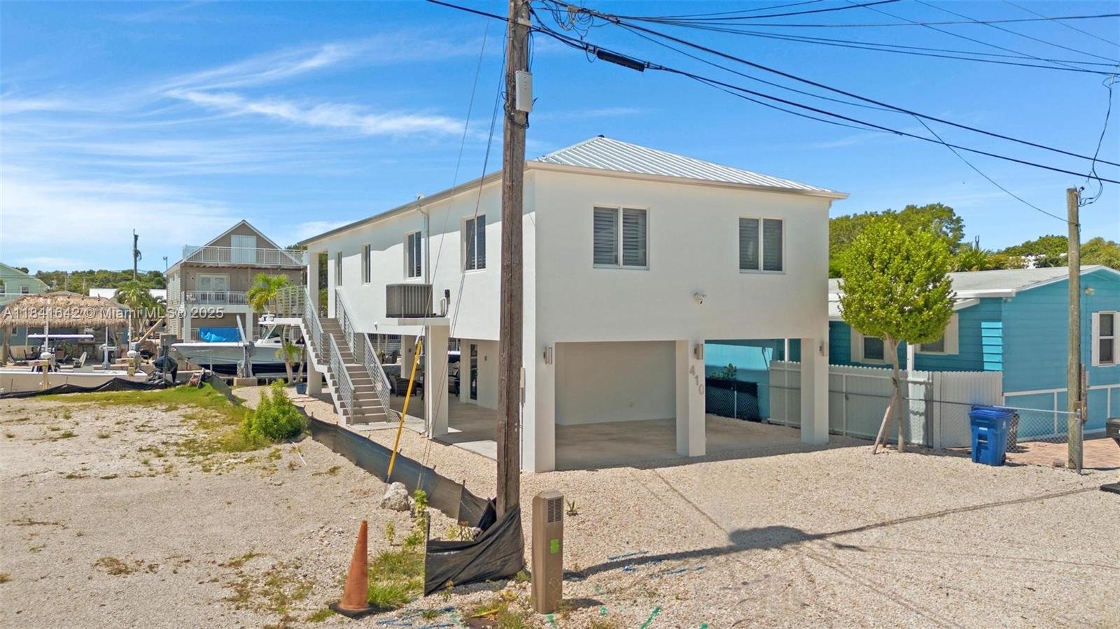 Stunning waterfront exterior at 410 Bowie Ln - Home in Key Largo