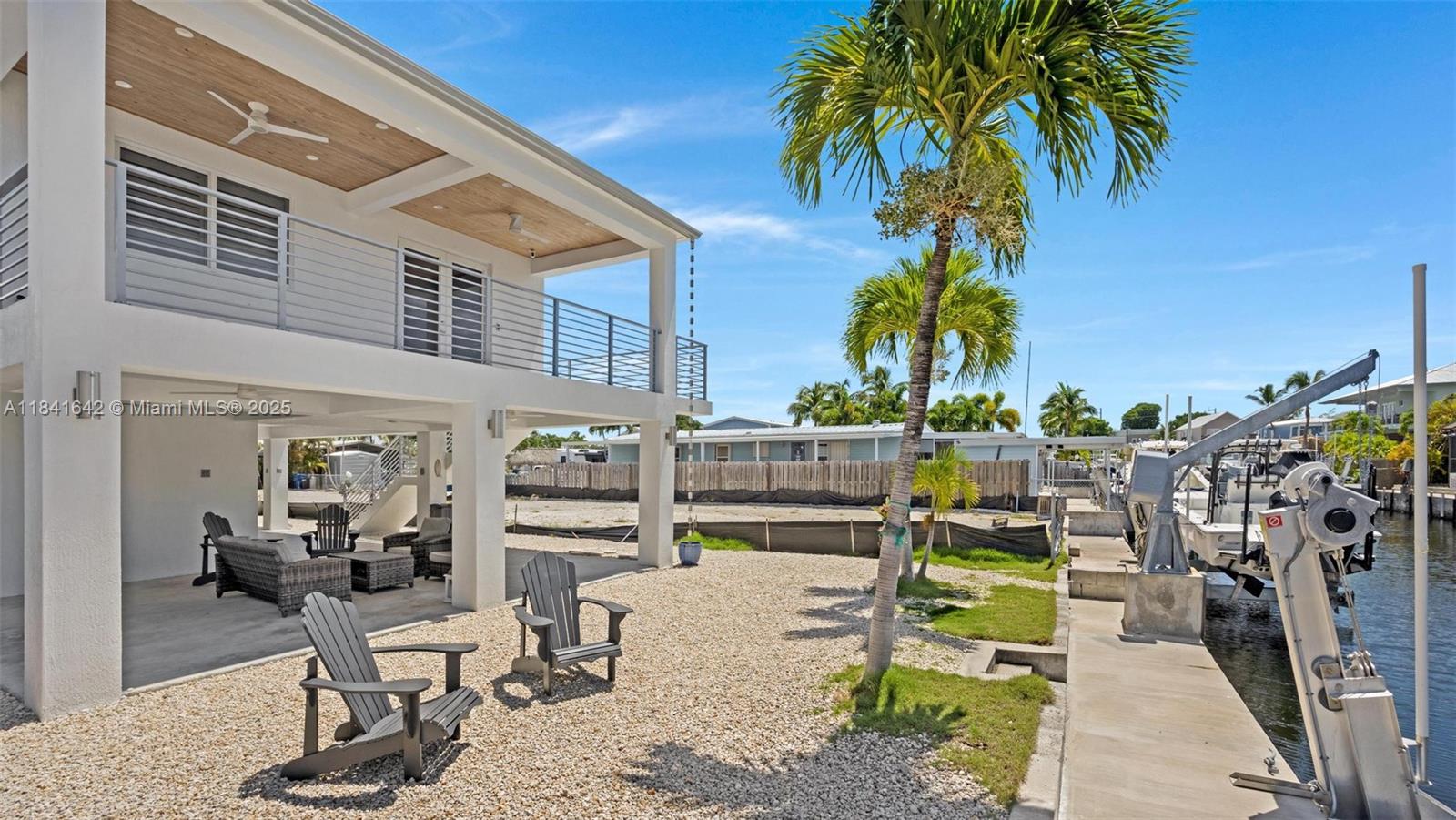 Spacious living room with panoramic views at 410 Bowie Ln - Home in Key Largo