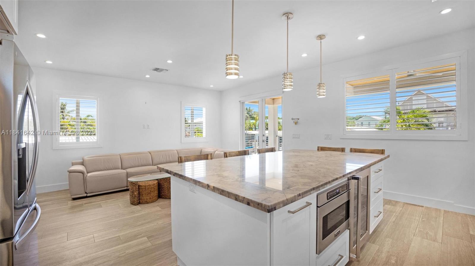 Spacious living room with panoramic views at 410 Bowie Ln - Home in Key Largo