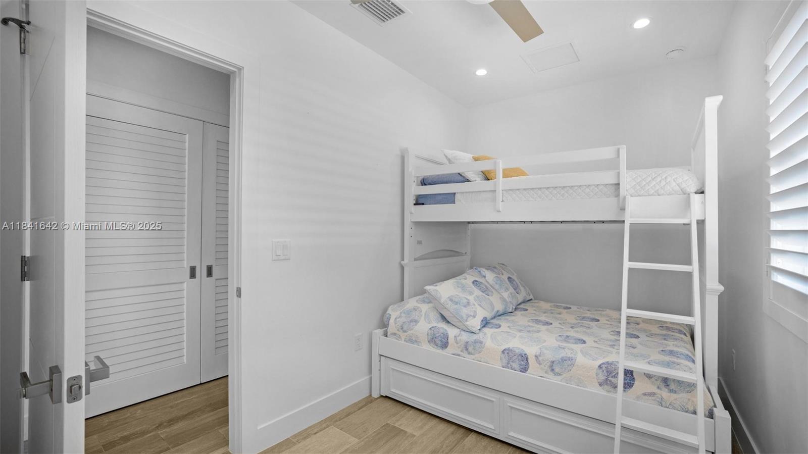 Elegant master bedroom retreat at 410 Bowie Ln - Home in Key Largo