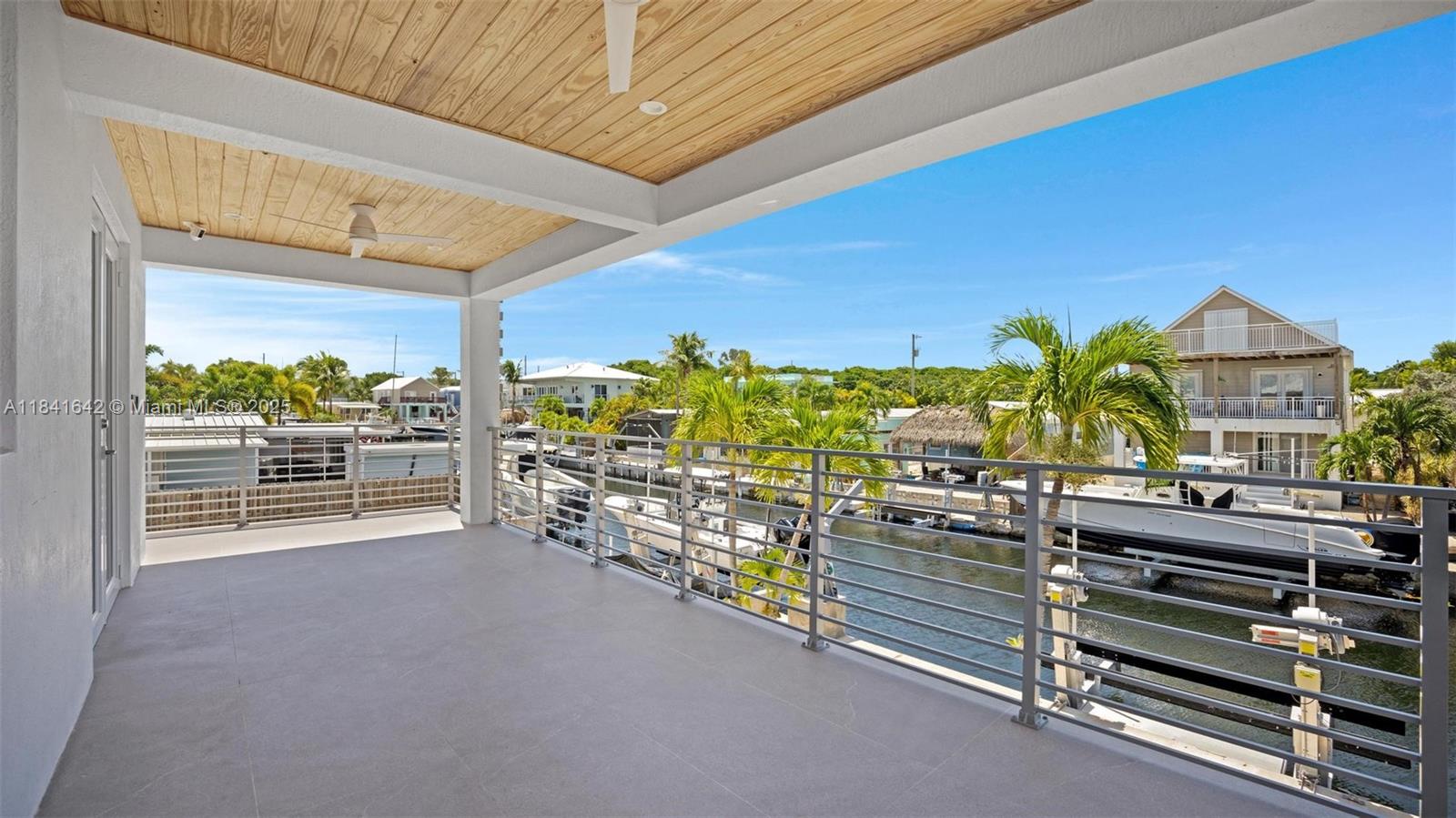 Spacious living room with panoramic views at 410 Bowie Ln - Home in Key Largo