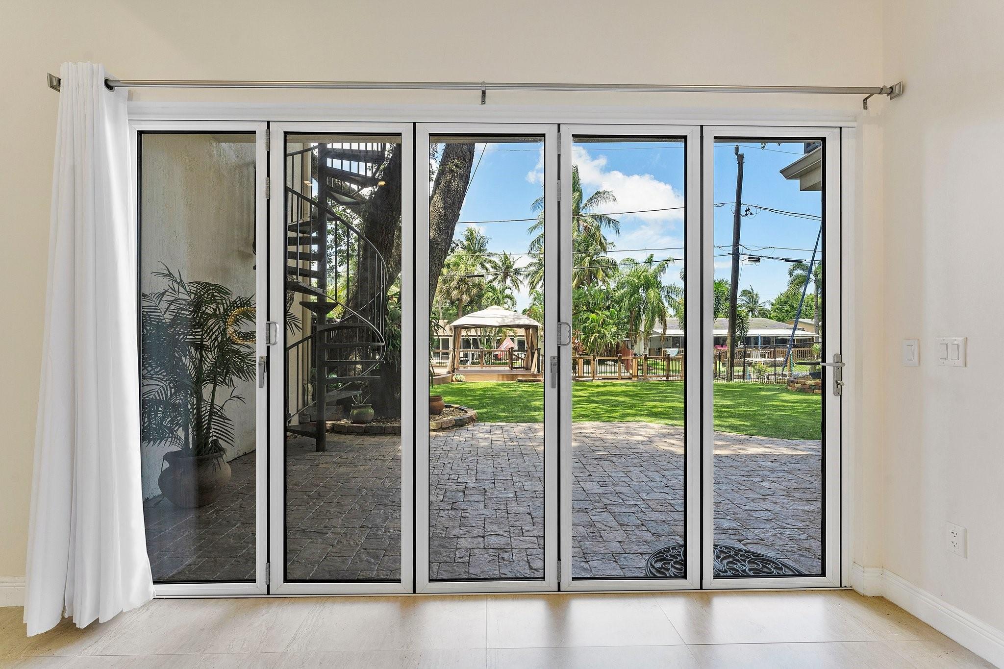 impact accordion door that fully opens space to exterior. Great flow to outside.