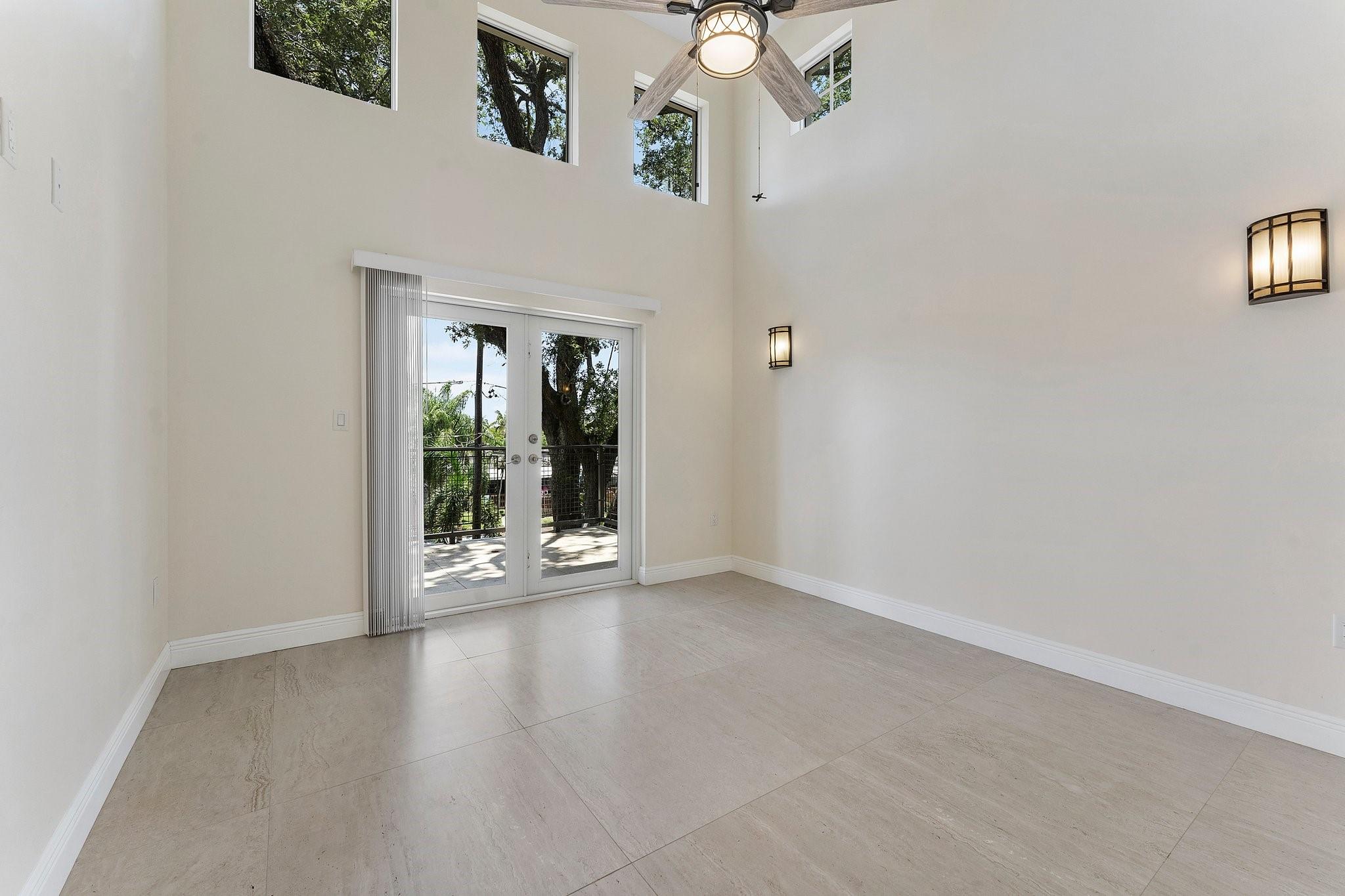 second floor media room with loft bedroom