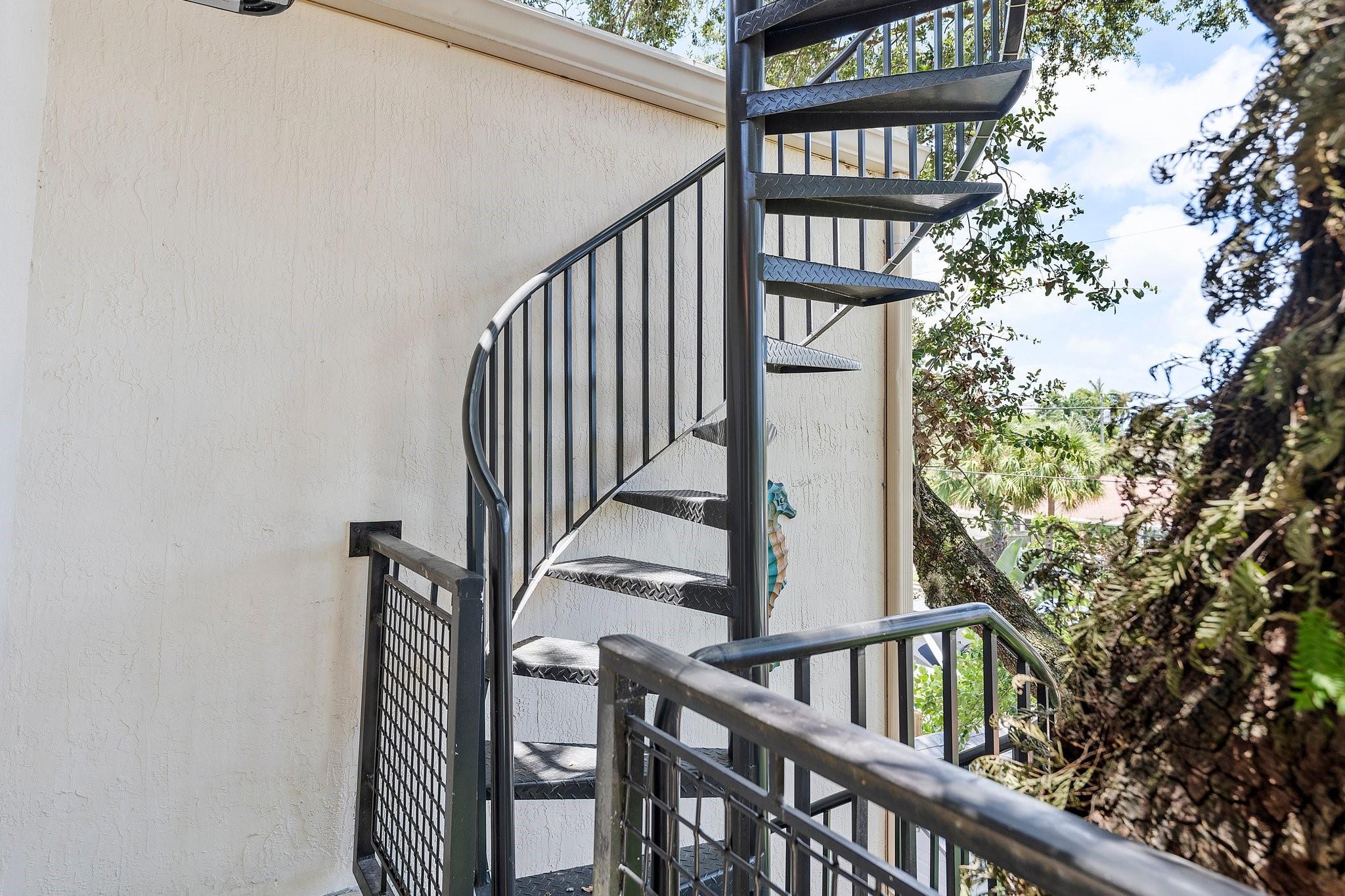 spiral staircase to rooftop perch
