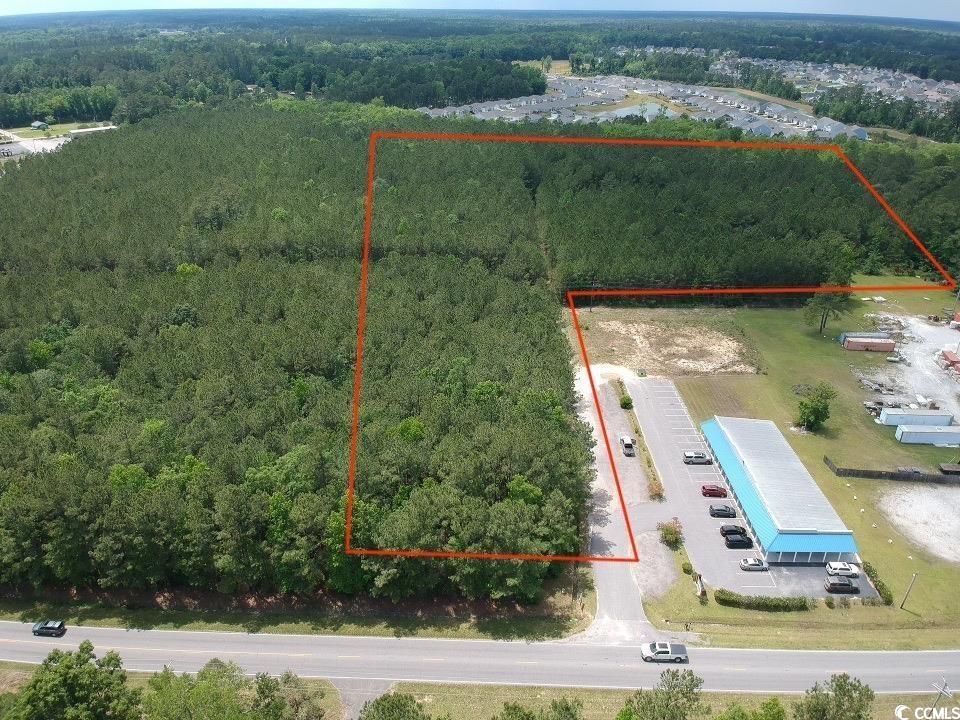 Location, Location, Location! Endless potential for future development for commercial property. This property is located in an area of rapid growth with the 22 corridor and the widening project of 701 N. Excellent location for an industrial park, or commercial buildings. Surrounded by other industrial parks, large businesses and multiple commercial used buildings featuring one of Horry county's largest business HTC. Property is zoned MA-2 Traffic count in 2024 was 14,300. Property is approximately 3.5 miles to Hwy. 22.