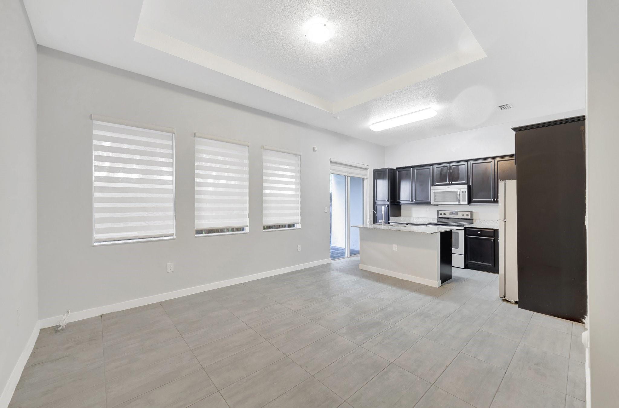 Nestled in the desirable Venetian Parc community, this charming 2story townhome offers 3/2.5, & 1car garage. Porcelain flooring thru out the 1st level, seamlessly connecting the open-concept kitchen & inviting family room perfect for both everyday living & entertaining. The private fenced-in patio features 2 stunning Sylvester palm trees, creating a serene outdoor retreat. Inside, enjoy the benefits of a complete alkaline water filtration system for the entire home, plus an add'l reverse osmosis/hydrogen water filter in the kitchen for optimal drinking water. Upstairs, the spacious primary bedroom boasts a private balcony, walk-in closet, & a luxurious ensuite w/ dual vanity sinks, large shower, & Roman tub. The laundry room is located upstairs. Also included A Level 2 EV charging station.