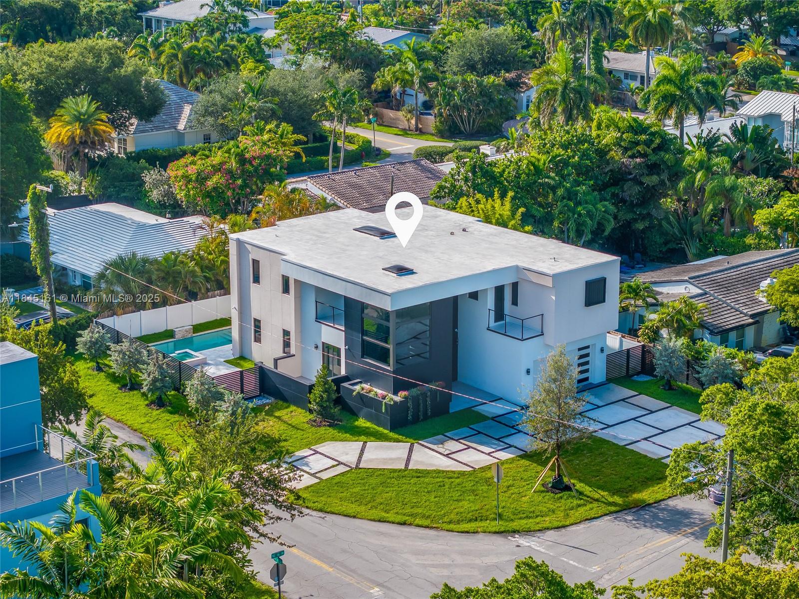 Spectacular brand-new construction offering 3,184 sq ft of refined living and 5,224 sq ft total in Victoria Park. This 5-bed /4.5-bath modern estate features a glass bridge connecting both wings, soaring ceilings, polished porcelain floors, and floor-to-ceiling impact glass. Gourmet kitchen with custom cabinetry, quartz waterfall counters, premium Jen Air appliances, and Liebherr wine fridge. Spacious master suite with oversized walk-in closet and spa-style bath. First-floor office opens to a private “secret garden” balcony. Backyard oasis boasts a pool with a jacuzzi and waterfall, lush landscaping, and covered patio. Two skylights, floating stairway, butler pantry, and dimmable lighting throughout complete this exceptional residence designed for elevated living.