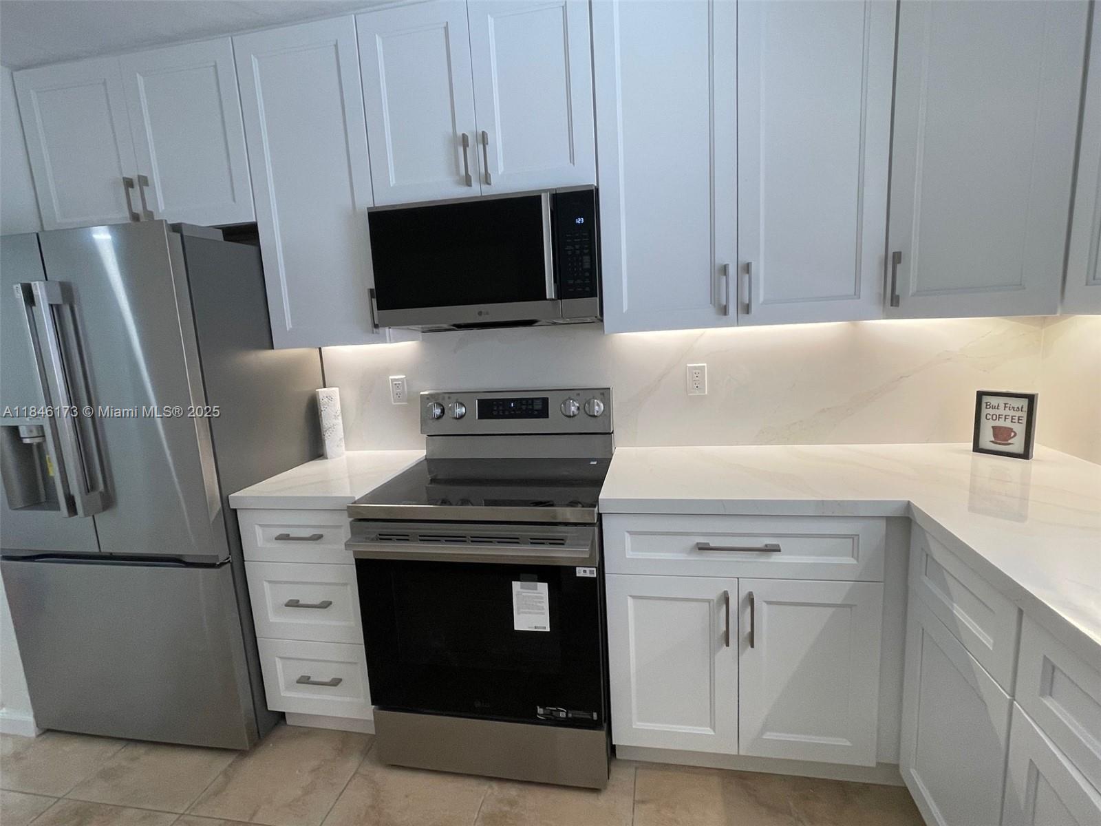 BEAUTIFUL REMODELLED KITCHEN, QUALITY APPLIANCES, LIGHT AND BRIGHT APARTMENT WITH BALCONY OVERLOOKIING TREED COURTYARD, POOL.  NOT ON THE KENDALL DRIVE SIDE OF THIS COMPLEX.  FULL SIZE WASHER/DRYER IN LARGE WALK-IN CLOSET.  THREE LARGE BEDROOMS UPSTAIRS, TWO COULD BE CONSIDERED MASTER BEDROOM SIZE.  EASY TO SHOW - VACANT - ON LOK BOX.  OVER 1500 S.F., WINDOWS ON TWO SIDES OF APARTMENT.  SHOW IT - IT WILL RENT ITSELF!