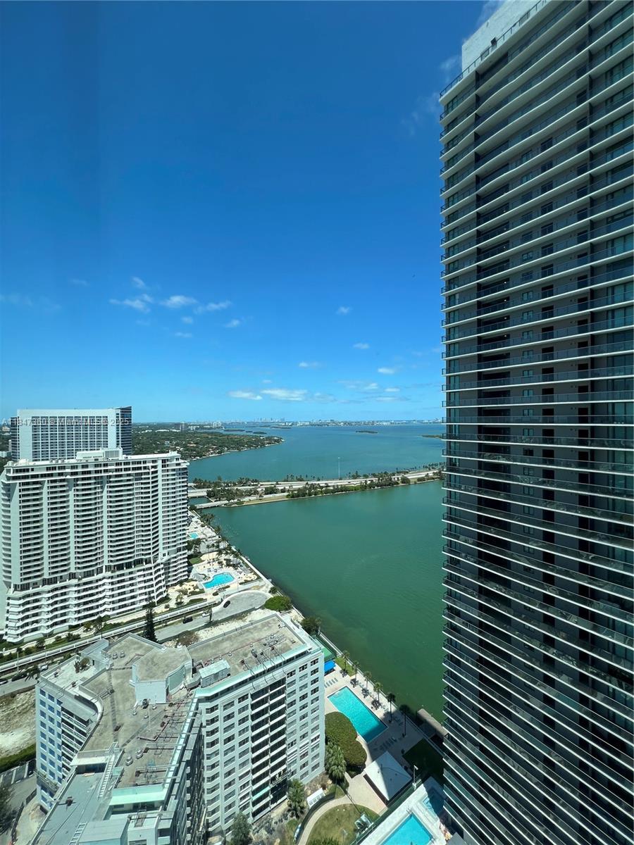 Enjoy this 1 BR + 1 1/2 BA with bay & city views at the Paraiso Bay in Edgewater. Living area with floor-to-ceiling windows all around. Enjoy any amenity you can think of ... 3-acre resort deck loaded with a zero-entry heated swimming pool, outdoor spa, poolside cabanas, summer kitchen, jogging circuit, gardens & landscaped sun terrace, clubroom with billiards, catering kitchen & multimedia facilities, gym, theatre, wine room, cigar lounge game room, children playroom, spa with steam & sauna, 2 tennis courts, golf simulator, bowling & multipurpose court! NOT SHOWINGS