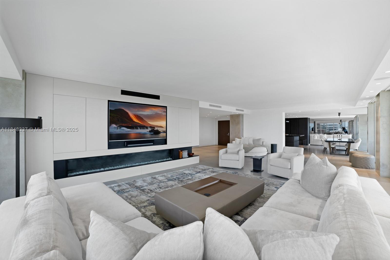 Welcome to Unit 1710, a masterpiece in luxury living, completely reimagined down to the studs. This expansive residence offers sweeping ocean & Intracoastal views from a high floor, flooding the space with natural light & capturing the essence of coastal elegance.Step inside to find 36 inch limestone floors throughout condo, terrace and columns curated layout adorned with only the finest materials. The gourmet kitchen is outfitted with top-of-the-line appliances. The spa-inspired bathrooms feature the most refined stonework and fixtures, delivering a five-star retreat experience at home. Unit has 5000 ft of limestone.Every inch of this residence exudes sophistication, comfort, and timeless design — all set within the prestigious Bal Harbour 101, known for its full-service amenities and oceanfront lifestyle.