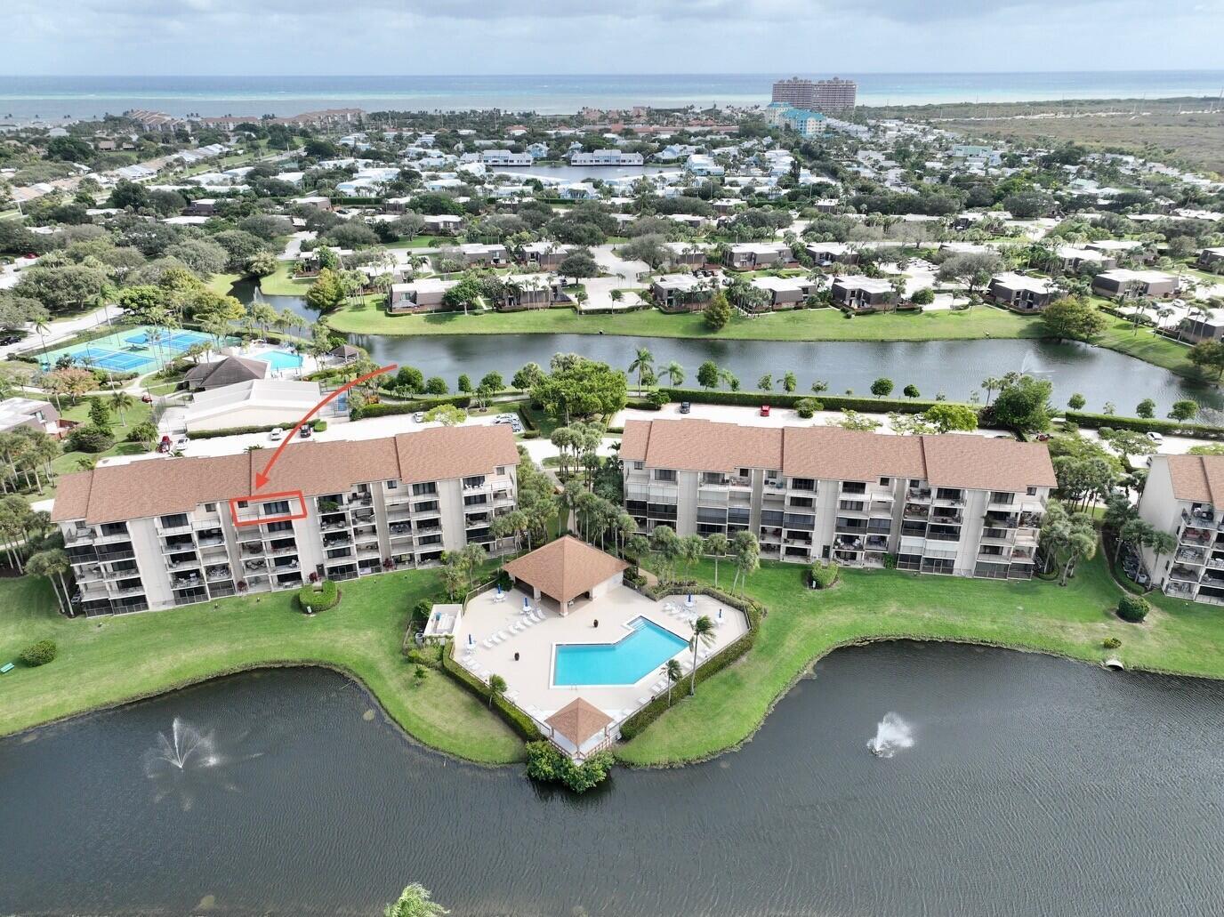 Rarely available top-floor condo in the prestigious Marina at the Bluffs. This beautifully updated 2BR/2BA residence features vaulted ceilings, new A/C, water heater (2024 & 2025), fresh paint, new carpet, updated appliances, and a renovated primary bath. Enjoy serene views from your private balcony in a quiet, top-floor setting. Just minutes to upscale dining, shopping, beaches, and golf. Resort-style amenities include pools, tennis, pickleball and marina access. A refined coastal retreat in Jupiter's most desirable location.  Schedule your showing for your home today!