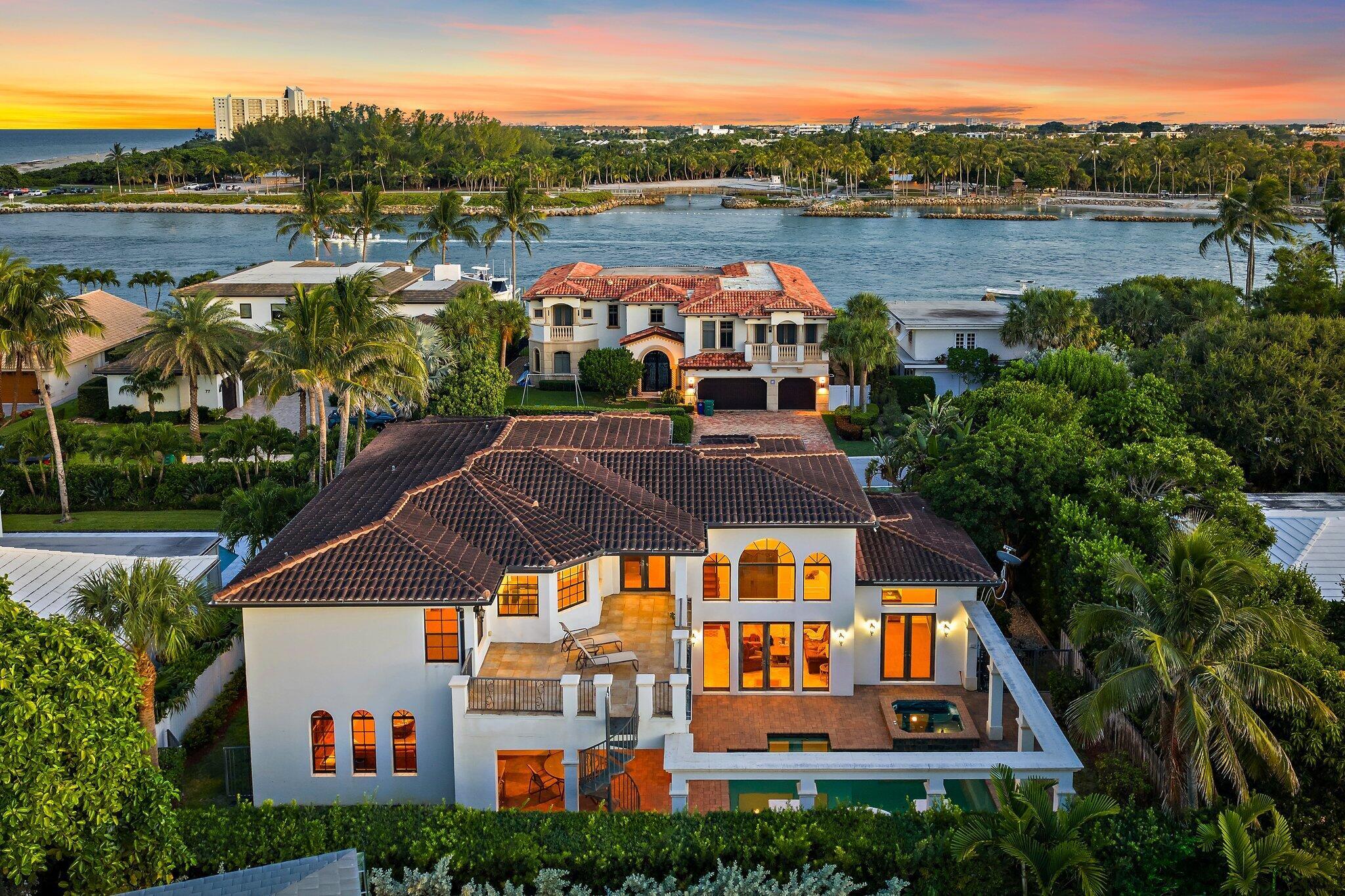 SOME PHOTOS ARE VIRTUALLY STAGED.  Welcome to one of the hidden gems of Palm Beach County, Jupiter Inlet Colony.  This signature estate home is located across the street from the Jupiter Inlet, and just steps from the turquosie water.  Located down the street, the private beach club with ocean and beach access provides the ultimate in seaside living in the heart of Jupiter.  This expansive home on an oversized lot has great features like beautiful marble and wood floors, large 1st floor mother-in-law/guest suite overlooking the backyard oasis with heated pool & spa, custom woodworking and ceiling details, high end appliances, and much more.  The Sellers are motivated, so please schedule a preview of this unique and special property today!