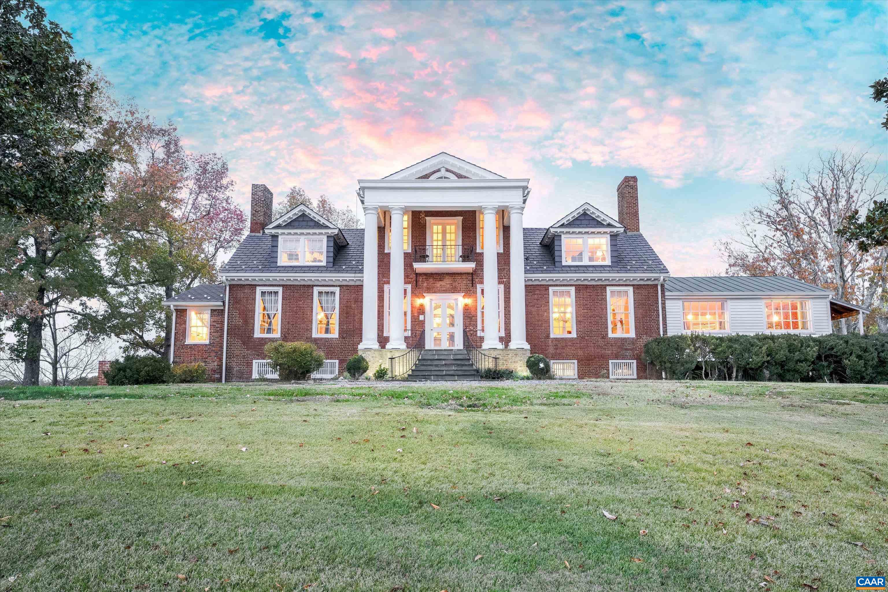 Perched just perfectly on a hill overlooking the Nelson County valley is Bon Aire, circa 1798, listed in the National Register of Historic Places & the Virginia Landmarks Register and was recently published on the cover of the Fine properties magazine. Built by Dr. George Cabell, Jr., this property embodies Jeffersonian influence and heritage. The county states there are (8) division rights. This distinctive hilltop estate offers 4 spacious bedrooms, 2.5 baths, 10-14 ft ceilings, hardwood floors, synthetic slate roof, gourmet kitchen, and 7 wood-burning fireplaces. Located in the basement is the Airbnb, “The Sunflower Room”, with private entrance, kitchenette, full bath, and bedroom. The 43-acre property has a fully updated 3-bed, 1 bath guest cottage with whole-house generator, a barn, and multiple outbuildings. The main house and the guest cottage have been thoughtfully restored while maintaining the historical integrity. There are graceful arches, recessed panels, Chippendale-style portico railings, and a staircase tucked within a side arch to the 2nd floor. The features are a design hallmark linked to Thomas Jefferson and his associates. Bonus! - $100,000 of farm equipment included with a full price offer.