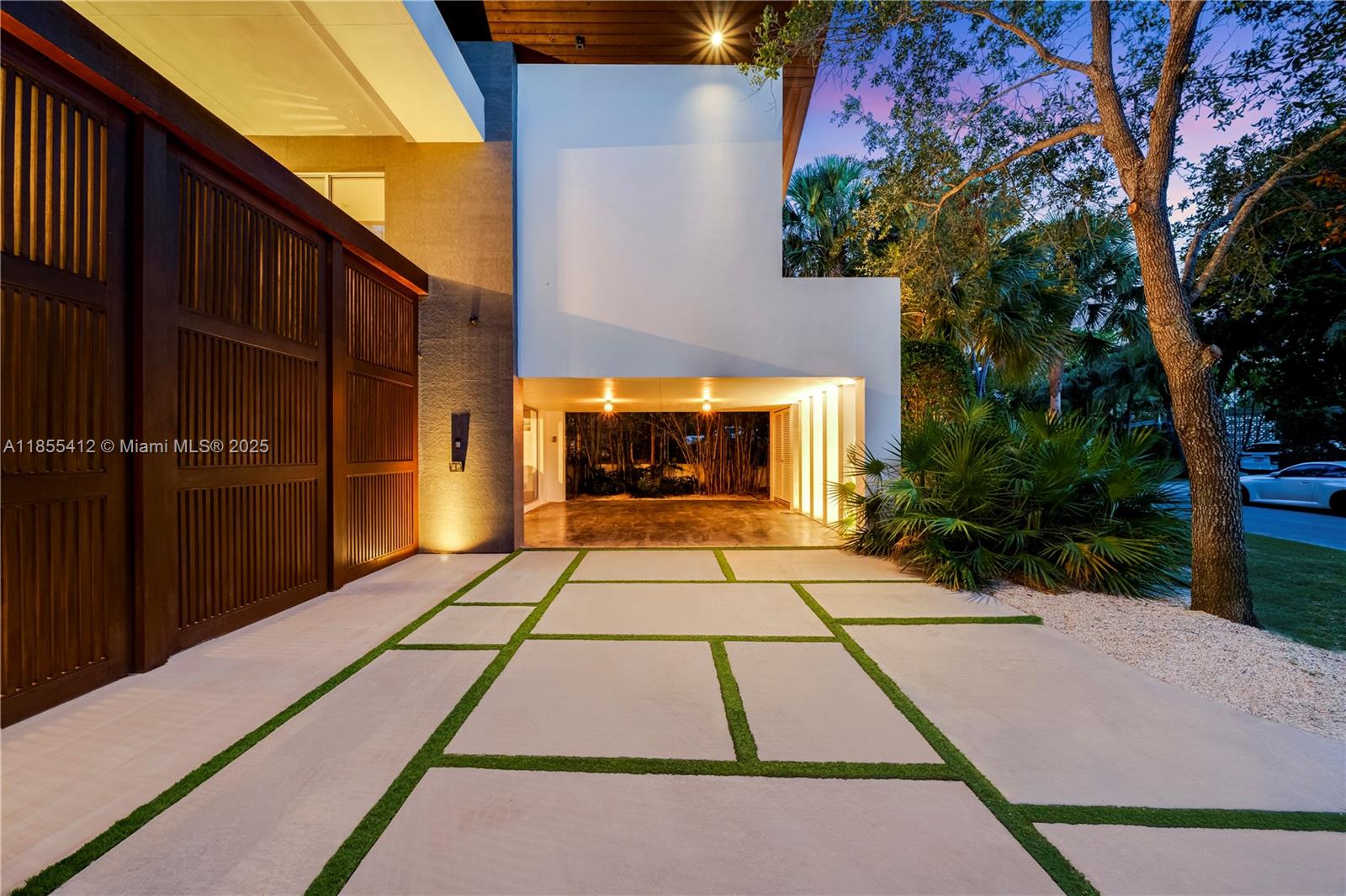 Key Biscayne – Architectural MasterpieceOn a secluded 9,633 sq.ft. lot near Harbor Drive, this 6,800 sq.ft. residence by Village Architects (Deborah de León) blends modern elegance with tropical serenity. A dramatic double wood door opens to a lap pool reminiscent of Amanpuri, framed by 2,000 sq.ft. of covered entertainment areas.Inside, a glass-walled foyer, soaring ceilings, and a sculptural staircase set the tone. Formal dining, reception, and a chef’s kitchen flow seamlessly for refined living. The master suite offers vaulted ceilings, walk-in closets, a spa bath, and an adjacent office, complemented by three additional en-suite bedrooms.Rare offering of design,privacy & resort-style living in the heart of Key Biscayne.Please view unbranded matterport  t, floor plans &  video.