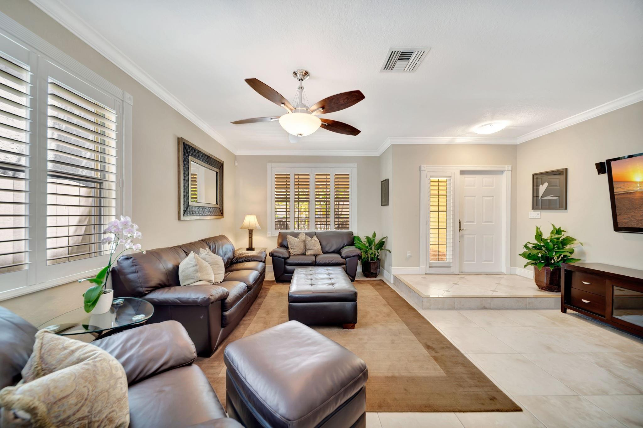 Your downtown lifestyle begins here! Experience the best of Ft. Lauderdale living in this charming two-story, three-bedroom townhome. A durable METAL ROOF adds timeless appeal, while the primary suite offers a spacious walk-in closet for everyday luxury. The interior offers two spacious living areas downstairs with an open kitchen concept & an airy upstairs offering three bedrooms/two baths. Outdoor living shines here — from the generous front porch to the additional back patio space that invites relaxing or entertaining. With only a minimal HOA fee ($125/MONTH), this home provides low-maintenance freedom in the heart of the city. From morning coffee on your front porch to evenings out on Las Olas, this downtown Ft Lauderdale townhome brings the best of city living right to your doorstep!