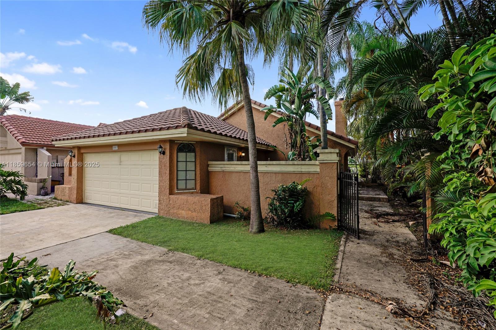 The Villages of Hillsboro – Single Family Home Spacious 3-bedroom, 2-bath home with 1,604 sq. ft. of living space, situated on a 5,075 sq. ft. lot, and a 2-car garage. Enjoy a large backyard—perfect for adding a pool and outdoor kitchen. Features include French doors leading to an enclosed screened patio, tiled floors, stainless steel appliances, ceiling fans, and a cozy fireplace. The garage offers a utility sink, washer/dryer hookup, and a Titan tankless water heater. The primary suite boasts a large walk-in closet. Community amenities include a playground, basketball courts, tennis courts, and a boat ramp.