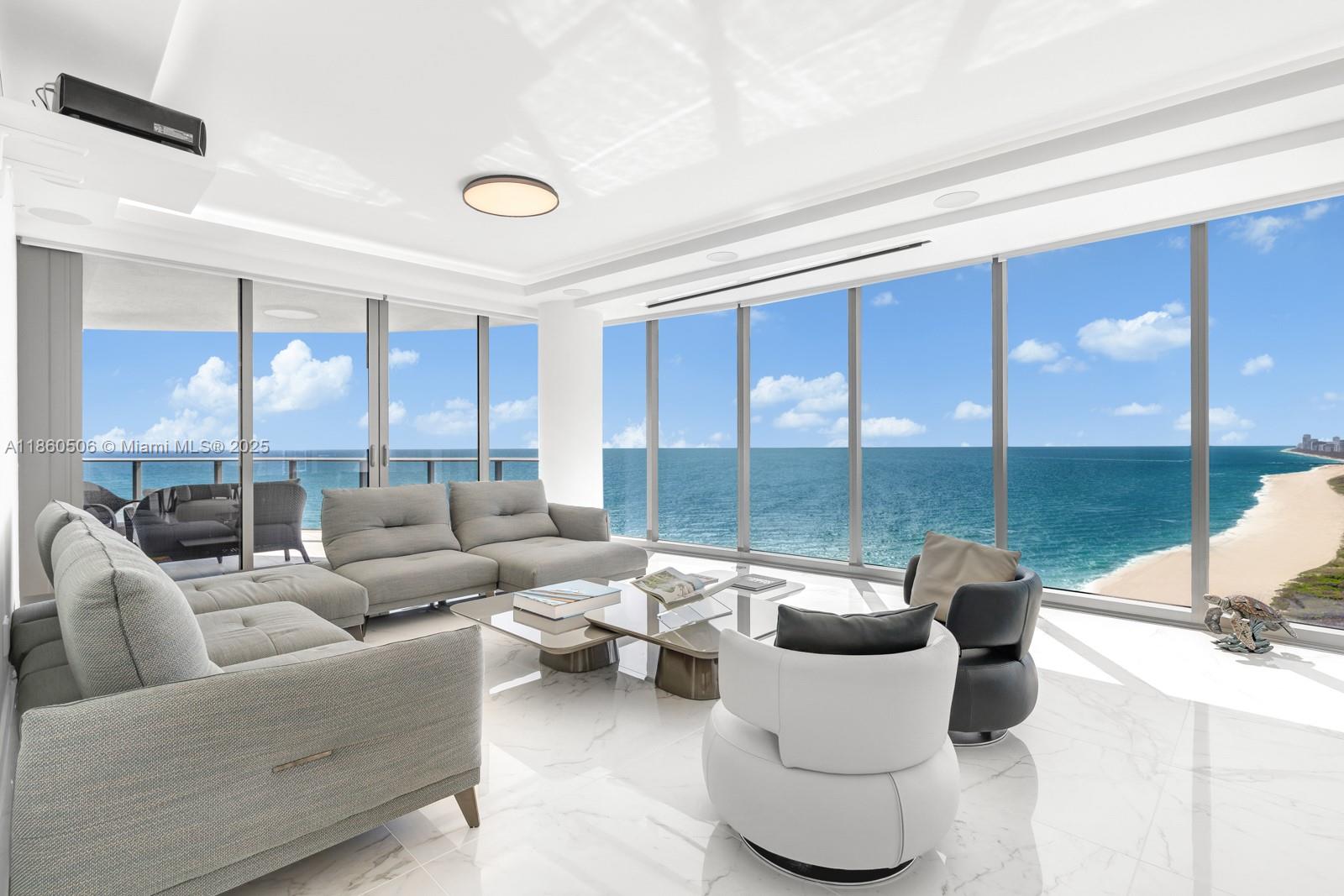 Discover exceptional craftsmanship at this luxurious Ritz-Carlton residence featuring 270-degree direct ocean views. Step from your private elevator landing into an open-concept living space where 10-foot floor-to-ceiling windows frame breathtaking Atlantic Ocean and Miami skyline panoramas. This meticulously upgraded 4-bedroom, 5.5-bathroom condo showcases reflective ceiling details, Lutron home automation, exquisite marble flooring, and custom Pianca closets. Four balconies invite you to embrace refreshing ocean breezes. Enjoy world-class amenities including beach access, restaurant services, dual pools, spa facilities, fitness center, 24-hour concierge, and exclusive club-level lounge—all delivering the impeccable quality synonymous with Ritz-Carlton living.