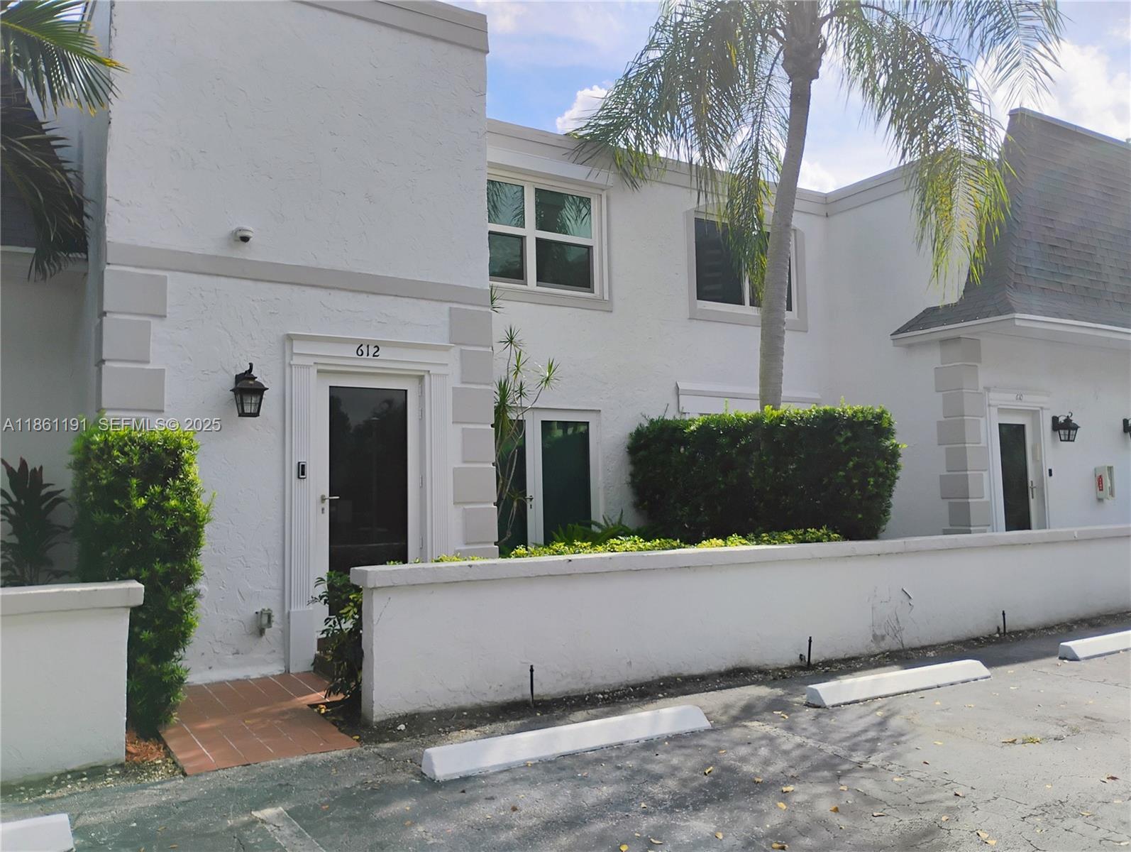 Discover the Best of South Florida Living in Desirable Three Island Venetian Park East!Enjoy the ultimate in convenience and style with this beautifully updated 2-bedroom, 2.5-bathroom home. The light-filled, open-concept downstairs features an updated kitchen designed for entertaining, complete with a double oven and a sophisticated wine cooler. A convenient half-bath is located on the main level.Upstairs, two full baths ensure comfort and privacy, with the washer and dryer thoughtfully situated on this level for ultimate ease.Step outside and enjoy the vibrant community of Venetian Park. Just a short walk from your front door, you'll find the community clubhouse, sparkling pool, and tennis courts. The home offers two dedicated parking spaces right in front, plus ample guest parking nearby. Homeowners Association (HOA) with fullyreserves FHA and VA Loans accepted, New gym in club house and new roof with no assessments.as of Jan 1, 26 the HOA fees are going down $50 from $646 to $596