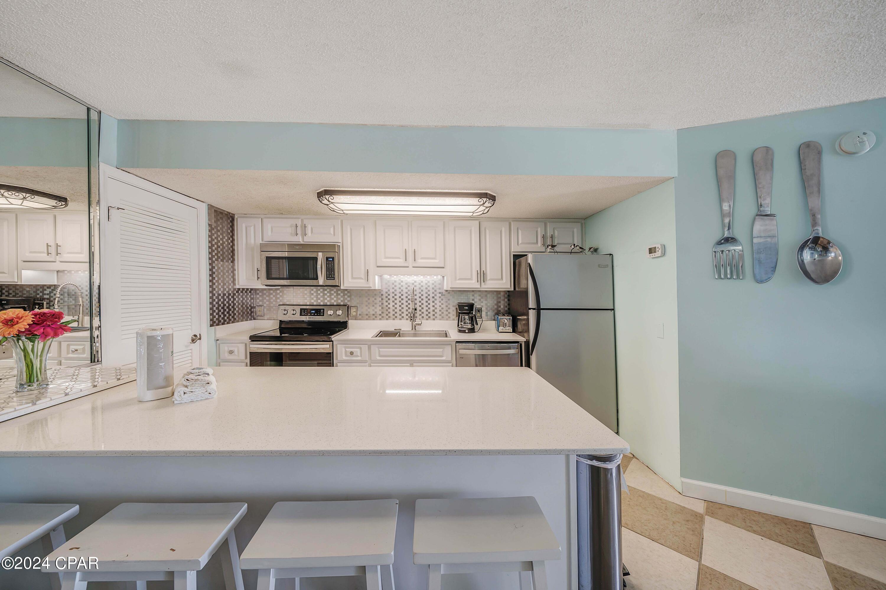 Image 10 For 8610 Surf Drive 306