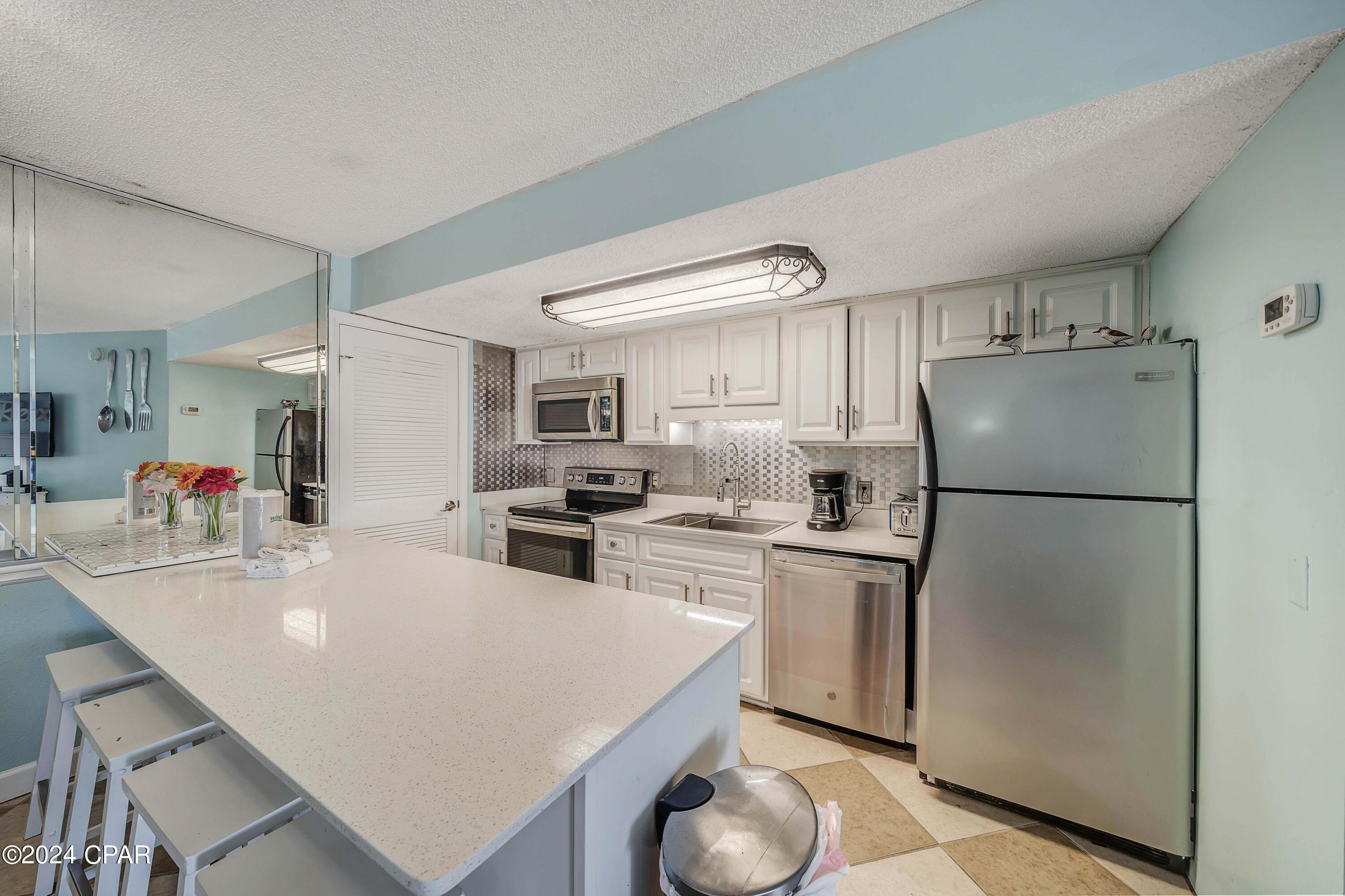 Image 11 For 8610 Surf Drive 306