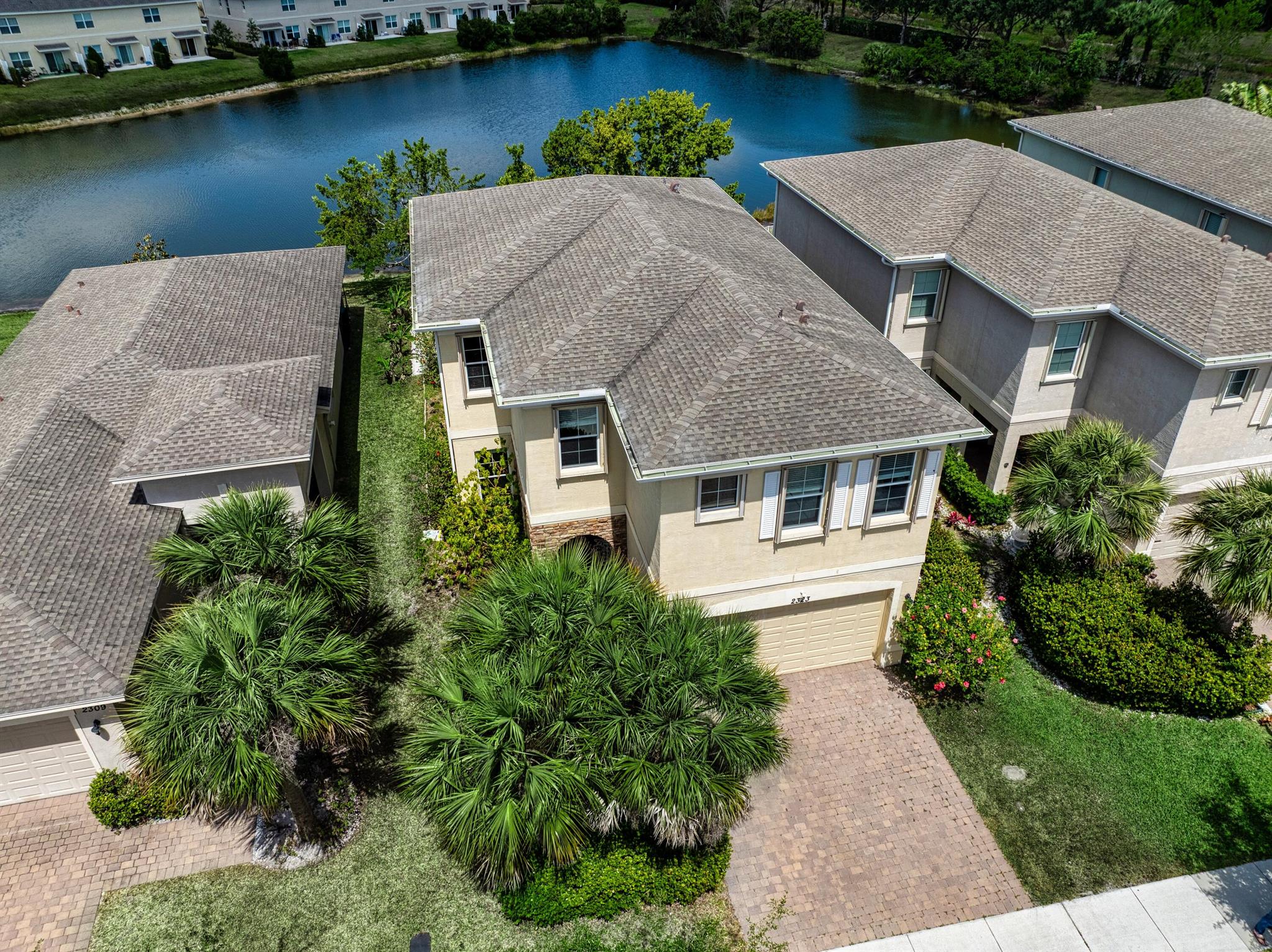 Spacious 3 bed, 2.5 bath home with loft and over 2,500 sq ft of living space, featuring stunning lake views. Enjoy peace of mind with a whole-house Generac generator powered by an underground propane tank, also connected to a built-in grill hookup. The expansive master suite offers a luxurious bath with dual sinks, a stand-up shower, soaking tub, and a walk-in dream closet (converted from the 4th bedroom--easily reversible). The open-concept design includes a huge family room and an upgraded kitchen that overlooks your screened-in lanai, complete with pool, hot tub, and breathtaking water views. Welcome to Vizcaya Falls, a vibrant family-friendly community packed with amazing amenities for all ages--from basketball courts and a resort-style pool to a playground and more!