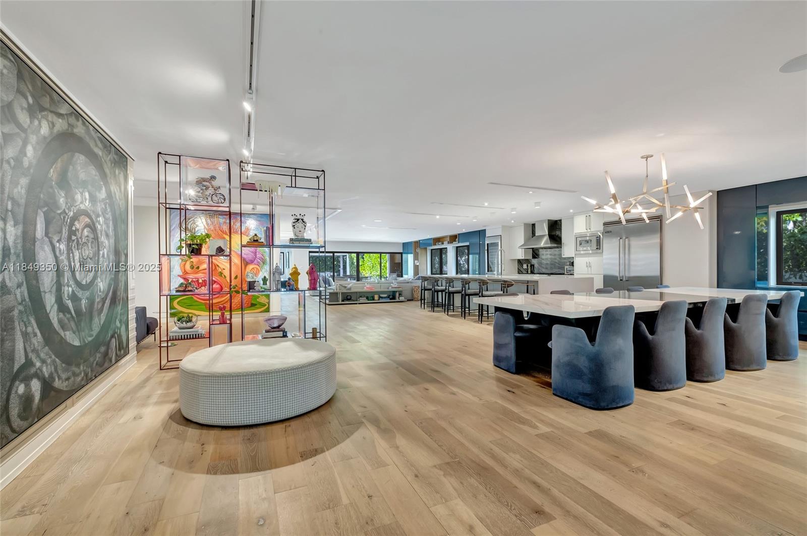 Welcome to this professionally designed, fully furnished, one-story 4,300 sq. ft. 5-bed, 5-bath by Dida Homes—completely rebuilt in 2015 and located in the coveted walkable South Bayshore neighborhood. Steps from Lincoln, Golf Course, Sunset Harbour, the beaches, this modern transformation offers all the luxuries of new construction without the price. Features include a heated pool, impact windows/doors, metal roof (2023), 2-car AC garage, laundry room, expanded chef’s kitchen w/Viking appliances, Savant smart home automation, motorized window treatments, indoor/outdoor speakers, security cameras. and more. Outdoors —an upgraded deck, limestone pavers, lit pergola, and a mosquito misting system create the perfect private retreat. As Featured in Florida Design Magazine! TURNKEY perfection.