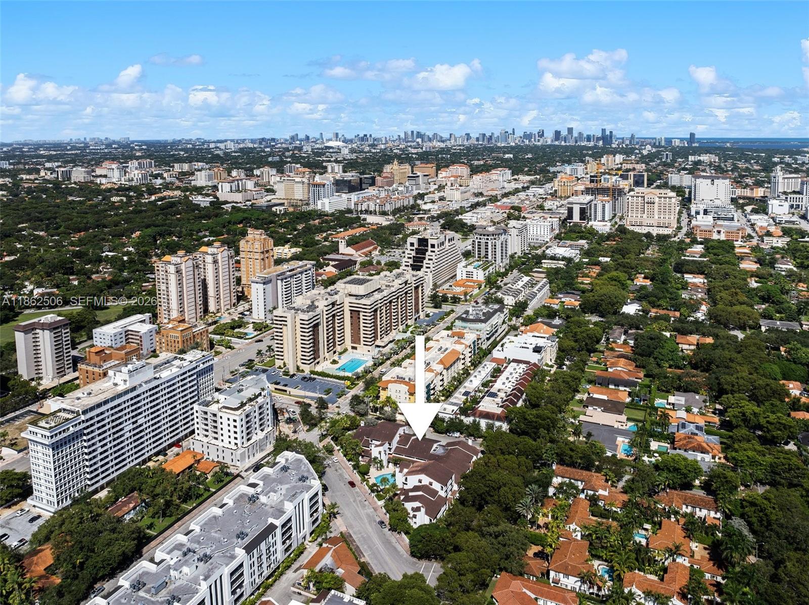 Move-in ready remodeled townhome located within a well-maintained Coral Gables community. This residence offers 2 bedrooms and 2.5 bathrooms, with an open floor plan ideal for everyday living and entertaining. The home includes a fully remodeled kitchen and fully remodeled bathrooms, along with wood flooring throughout, creating bright and functional interiors.The home also features a dedicated office space, ideal for remote work or a flex area. The primary bedroom offers three closets, and the townhome provides ample interior storage throughout. Additional features include a private entrance with covered porch, new A/C, new water heater, three assigned parking spaces, and additional storage.The well-maintained community offers a pool and BBQ area. Conveniently located near Miracle Mile and Shops at Merrick Park, with easy access to dining, shopping, parks, and major roadways.