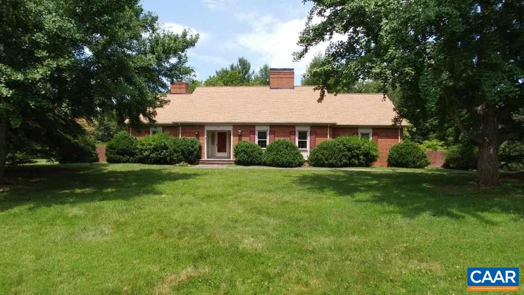Location, location, location! In the serene Montvue neighborhood near UVA, this all-brick executive rental features a renovated kitchen with stainless appliances and hardwood floors throughout much of the home. The flexible floor plan offers 3+ bedrooms, 3 full baths, and 3 fireplaces, plus formal living and dining rooms, a cozy den, a bright sunroom, and a basement family room with wet bar and second refrigerator. The lower level could easily serve as a guest suite or separate living quarters. A spacious laundry room, abundant storage, and generous off-street parking add convenience. Enjoy year-round sunsets and winter mountain views from the kitchen, porch, and den—country living just minutes from shopping, dining, and Barracks Road Shopping Center. No cats allowed, small dogs considered with additional deposit.