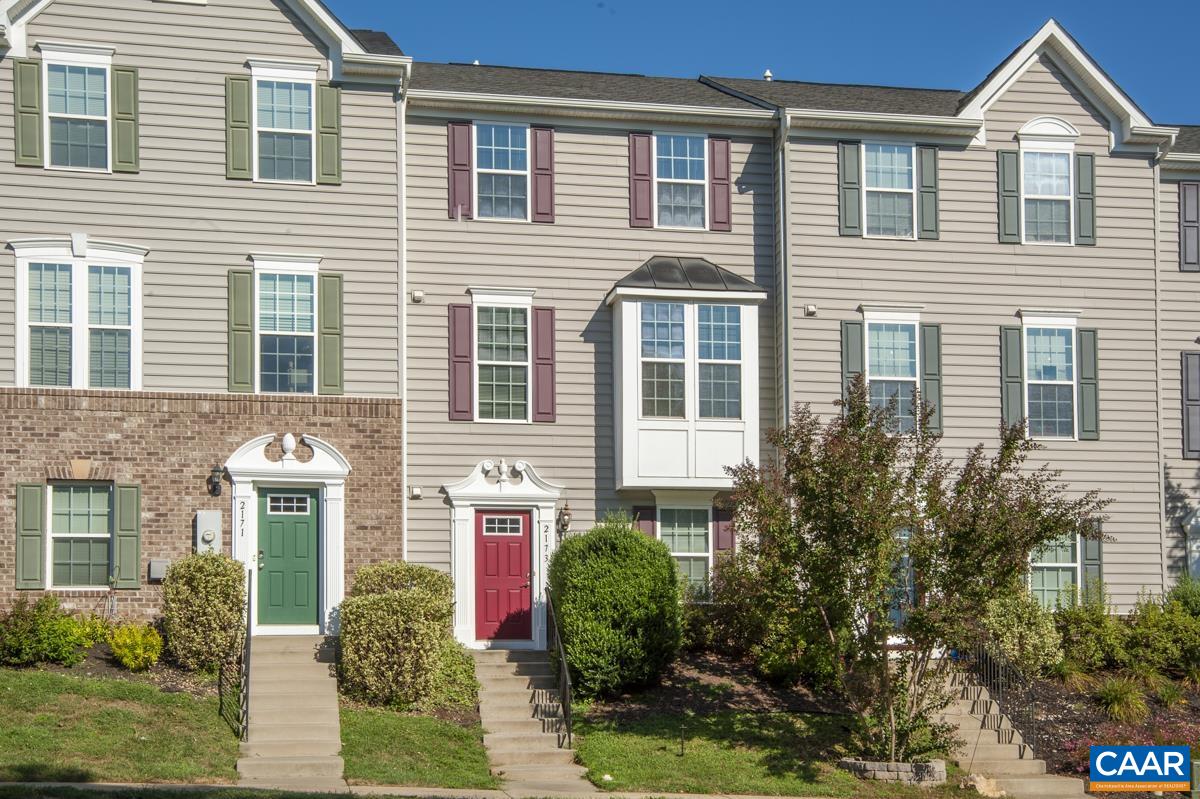 SPACIOUS 3BR/2FB/2HB TOWNHOME IN THE CONVENIENT RIVERWOOD NEIGHBORHOOD OF NORTHERN ALBEMARLE.  The main level features an open floor plan with 9-foot ceilings, a bright living room, dining area, and a large kitchen with plenty of counter space and cabinetry, perfect for everyday living and entertaining. Upstairs, the primary suite includes a walk-in closet and private bath, with two additional bedrooms sharing a full hall bath. Laundry hookups are also located upstairs for added convenience. A back patio and grassy yard provide space for outdoor living and relaxation. The entry level offers a versatile rec room, a home office, and a half bath. With more than 2,500 square feet of living space, this home offers comfort and functionality in a prime location close to NGIC, shopping, dining, and just minutes from Charlottesville.