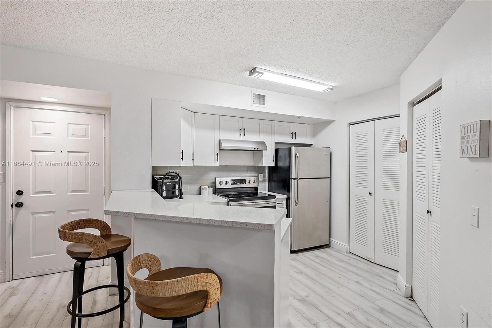 Well-appointed guest bedroom at 1200 Scotia Dr - Condo in Hypoluxo