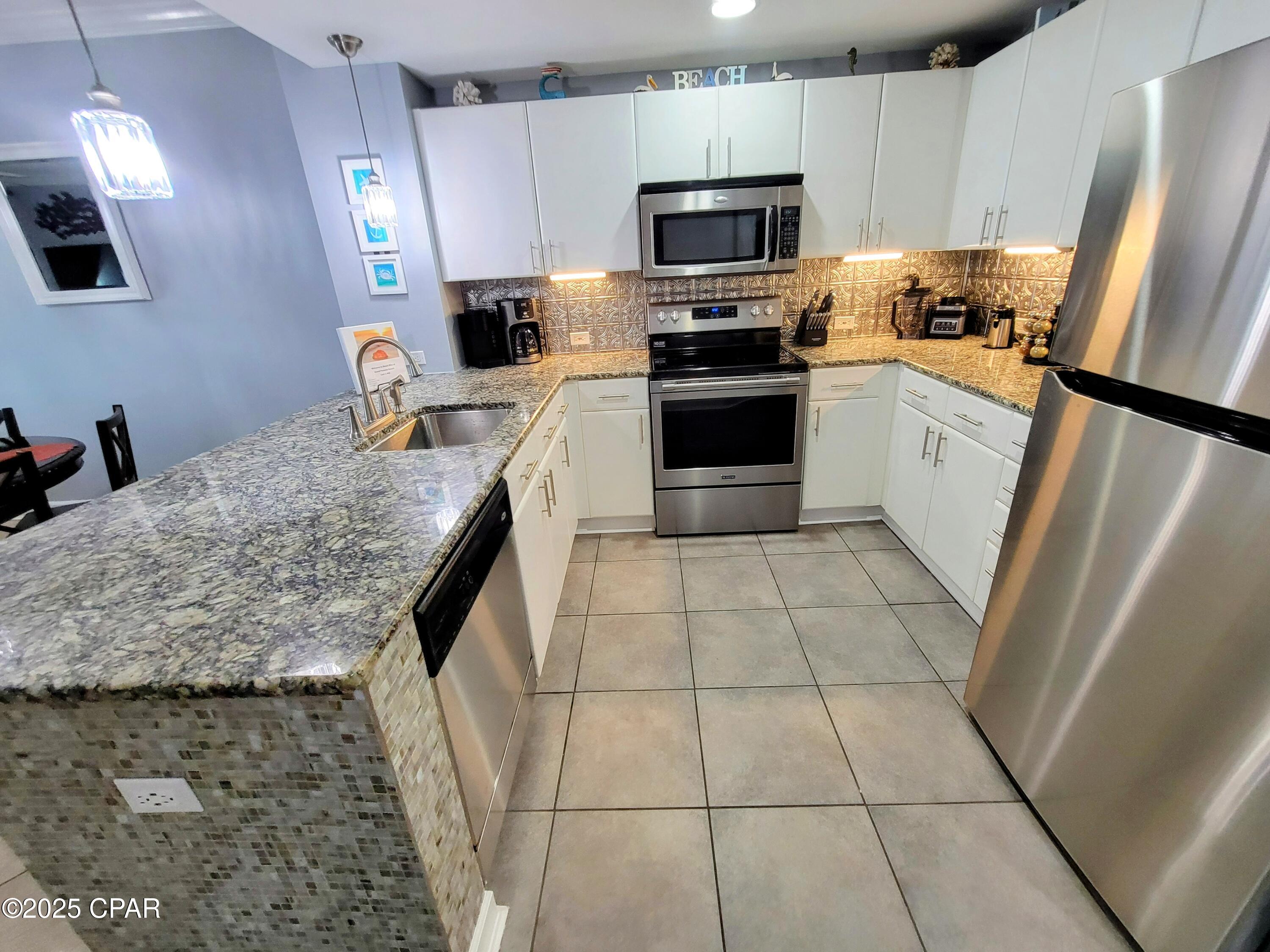 11807 Front Beach Road 1-402