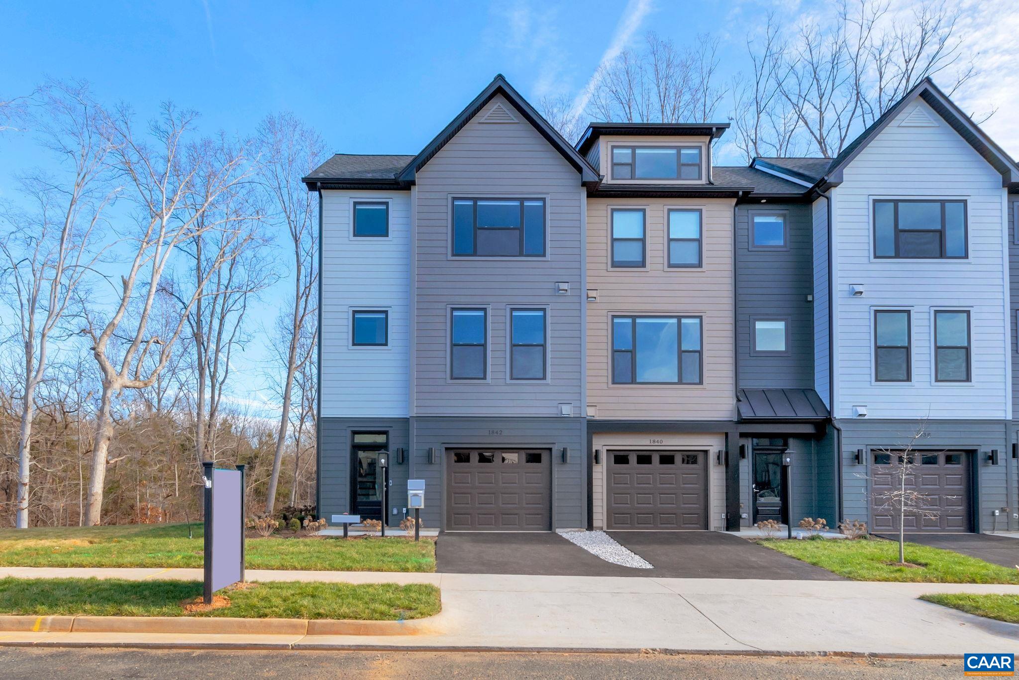 First time sale of this builder model home built in 2022.  Belvedere is an established community centrally located to all things C’ville, just 2.5 miles from downtown yet surrounded by nature. The Bainbridge has a thoughtfully designed open floorplan including a galley style kitchen, oversized 9’ island, & great room w/ fireplace making it perfect for entertaining. The well-appointed kitchen includes gas cooking, chimney hood, farm sink, & QUARTZ counters. An oversized TREX deck backs up to open space w/ mature trees for relaxing evenings or morning coffee. The primary suite & two additional bedrooms can be found upstairs, two full baths both w/ dual vanity sinks & side by side laundry completes this level. An attached garage, & spacious rec room/study w/ a full bath make up the entry level. Lawn care & TING fiber internet included in HOA. Pearl Certified. HERS Score 56. Actual photos.