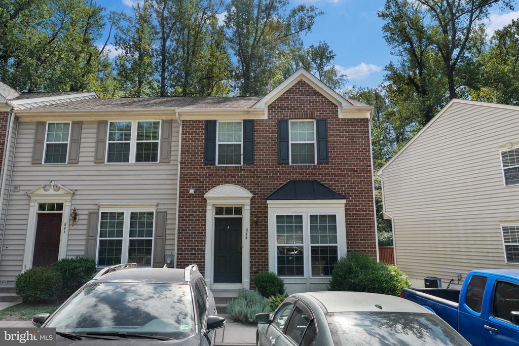 Beautiful brick, 3br 3.5-bathroom, end-unit townhouse on a quiet cul-de-sac just one mile from UVA! The living room is light filled with a front bay window and 2 side windows; the kitchen is bright with French doors and 2 windows. The kitchen is enhanced by granite counters, an island with room for stools, dining area, updated appliances, a pantry, and a bar on the living room side of the granite counter. Step outside through the French doors to enjoy the private deck which backs to trees. The lower level offers flexible space for a large family room, office, rec room, guest suite or multi-generational living: including, a full bathroom and large walk-in closet. Upstairs there are 3 bedrooms with generous closets and 2 full bathrooms. Short walk to Forest Hills Park and just a walk or bus to nearby UVA hospital, University and Downtown.