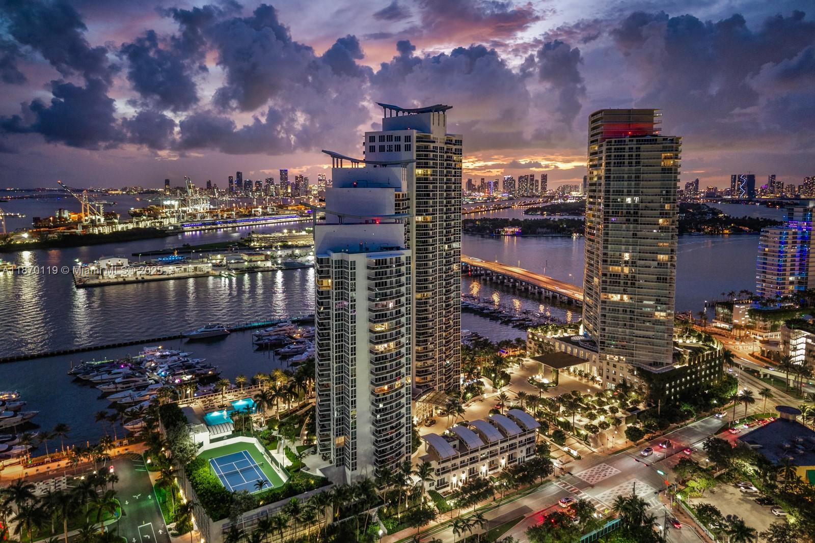 Discover luxury living in this stunning 2 BD | 2 BA | 2 HB townhouse in the prestigious South of Fifth neighborhood. This turnkey gem features soaring 14 FT ceilings that flood the space w/ natural light, creating an airy, open atmosphere throughout its 1,864 sqft. The fully renovated kitchen showcases top-tier appliances &amp; elegant limestone floors, while sophisticated Duravit fixtures elevate the bathrooms to spa-like retreats. Murano Grande offers pool w/ food and drink service, restaurant, tennis, gym, spa and is walking distance to the best dining Miami Beach has to offer including Catch, Carbone, Milos & more!