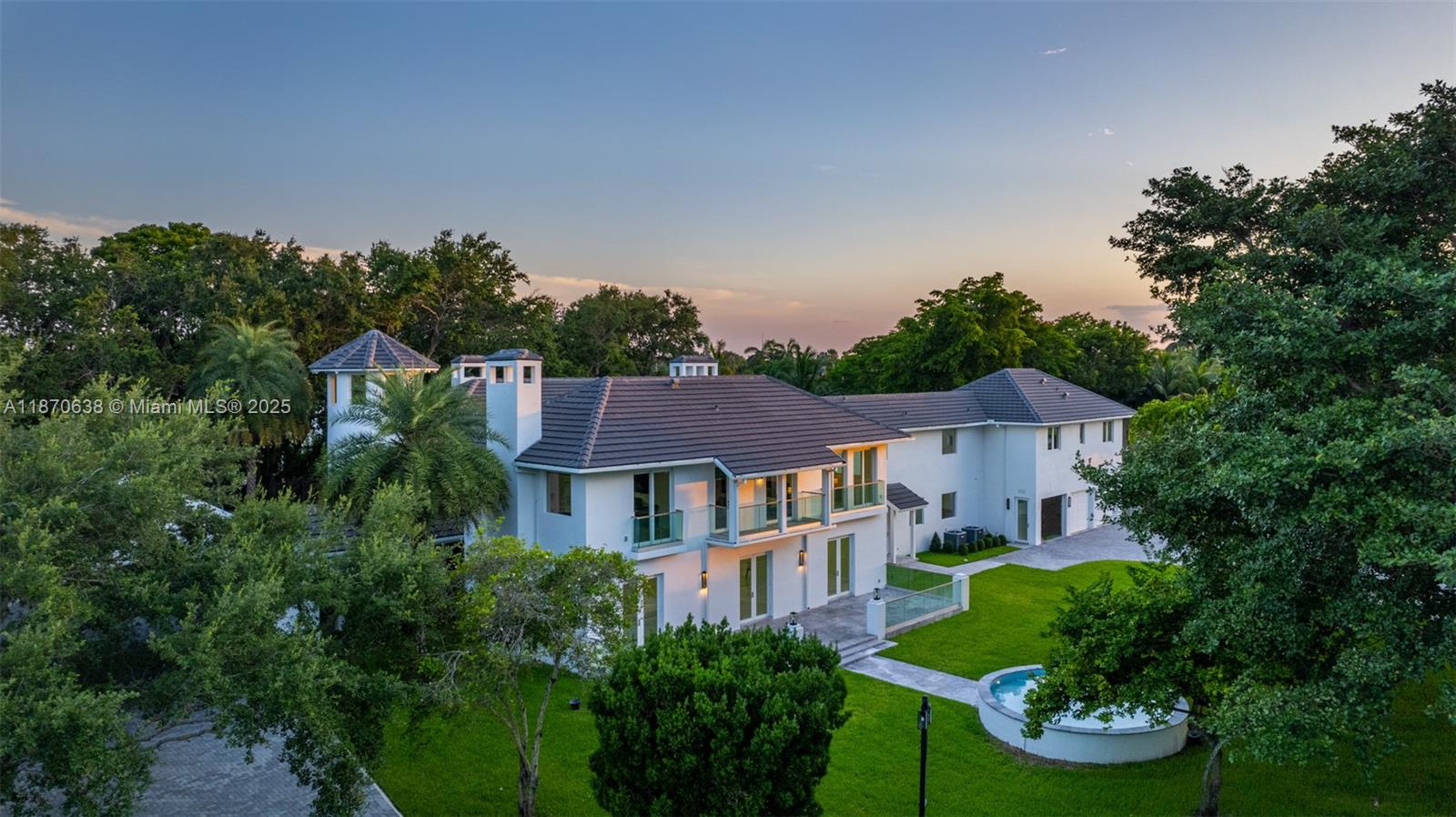 An iconic opportunity to own over 2 acres of luxury now transformed into a world-class gated estate.Spanning over 8000 SF this architectural masterpiece features 8 bedrooms, 8.5 bathrooms, and a dramatic grand foyer with soaring 30’ ceilings.Highlights include dual family rooms, an underground cinema, a chef’s gourmet kitchen  and a private apartment ideal for staff, nanny, or guests.The second level offers a lavish primary suite with private terrace, spa-inspired bath, and expansive closets, along with 5 additional en-suite bedrooms and a versatile loft office.Outside, discover resort-style amenities: a heated saltwater pool with spa, multi-sport tennis court, and lush landscaped grounds.Additional luxuries include a 3-car garage, brand-new roof, private elevator, and 24/7 security system