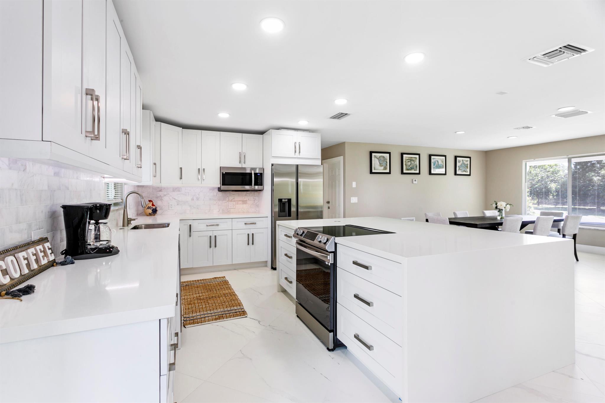 Homes for sale in Haverhill, FL | 5200 Club Road, Haverhill, FL 33415 | MLS# R11120571