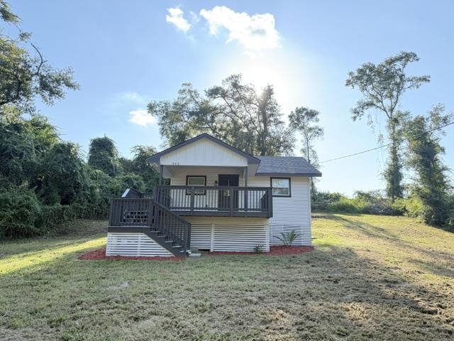 This charming 2 bedroom, 1 bath home has been fully remodeled from top to bottom, complete with a new roof in 2025. The bathroom boasts a stylish upgraded walk-in shower, while the kitchen features sleek stainless steel appliances. Off the kitchen, you’ll also enjoy a designated laundry room with modern finishes throughout. Move-in ready, this home blends comfort and convenience. The spacious yard offers plenty of room for outdoor projects, gardening, or future storage.