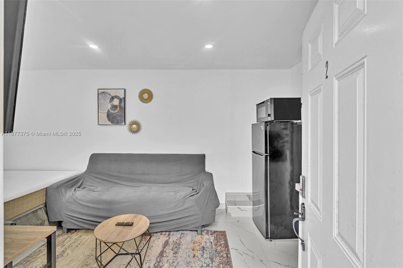 Open-concept living area at 4328 49th Ct - Condo in Dania Beach