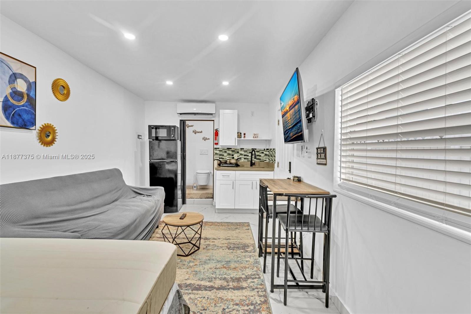 Well-appointed guest bedroom at 4328 49th Ct - Condo in Dania Beach