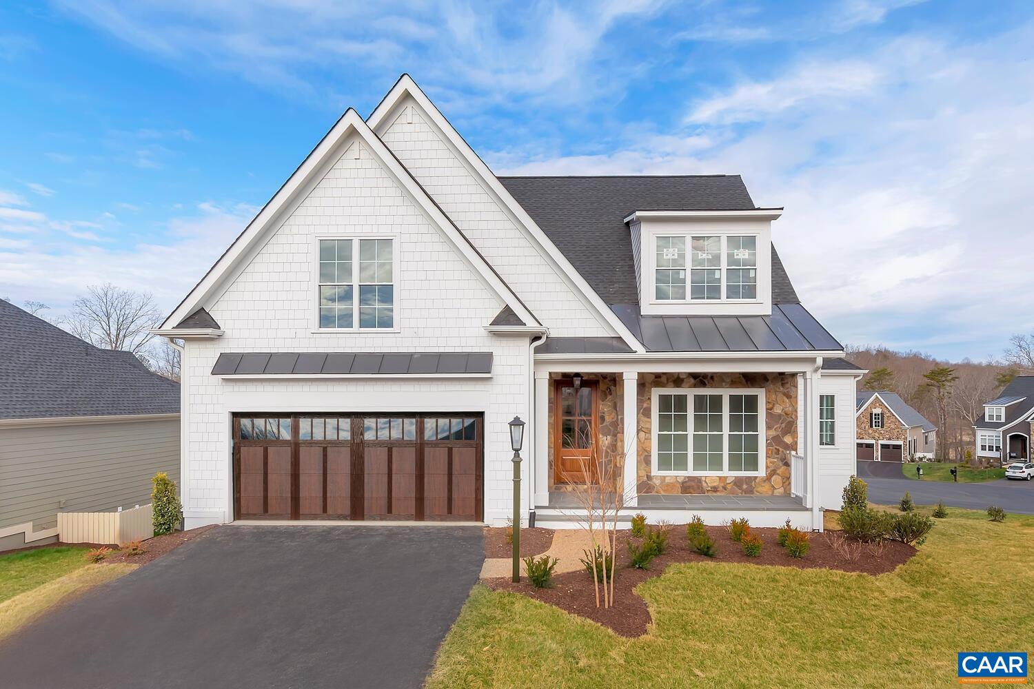 The Chesapeake floorplan offers a first floor primary suite. Notable features of the Chesapeake include, vaulted ceilings, expansive windows, walk-in pantry, dedicated study, 2nd floor loft and so much more! Quality features throughout including 2x6 exterior walls, R-19 insulation, energy efficient windows, custom Mahogany front door, wood shelving in owner's closets and pantry, 15 SEER HVAC with separate zones for each floor. Each home is tested for energy efficiency and HERS Score. North Pointe is a vibrant, walkable community featuring a clubhouse, fitness center, swimming pool, shops, and retail all convenient to 29N and Charlottesville. Semi-Custom. - Photos of similar home.